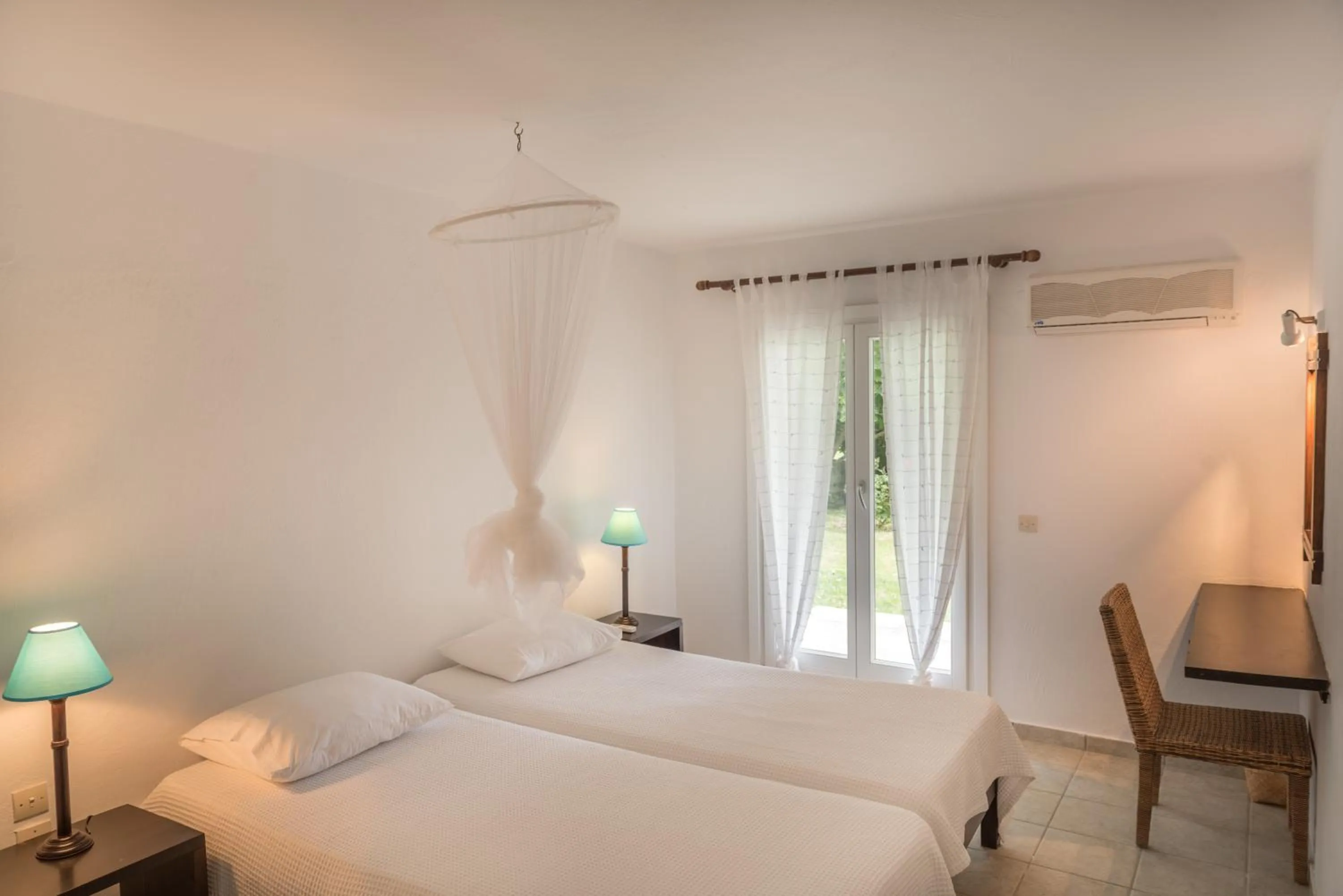 Bedroom, Bed in Skiathos Holidays Suites & Villas