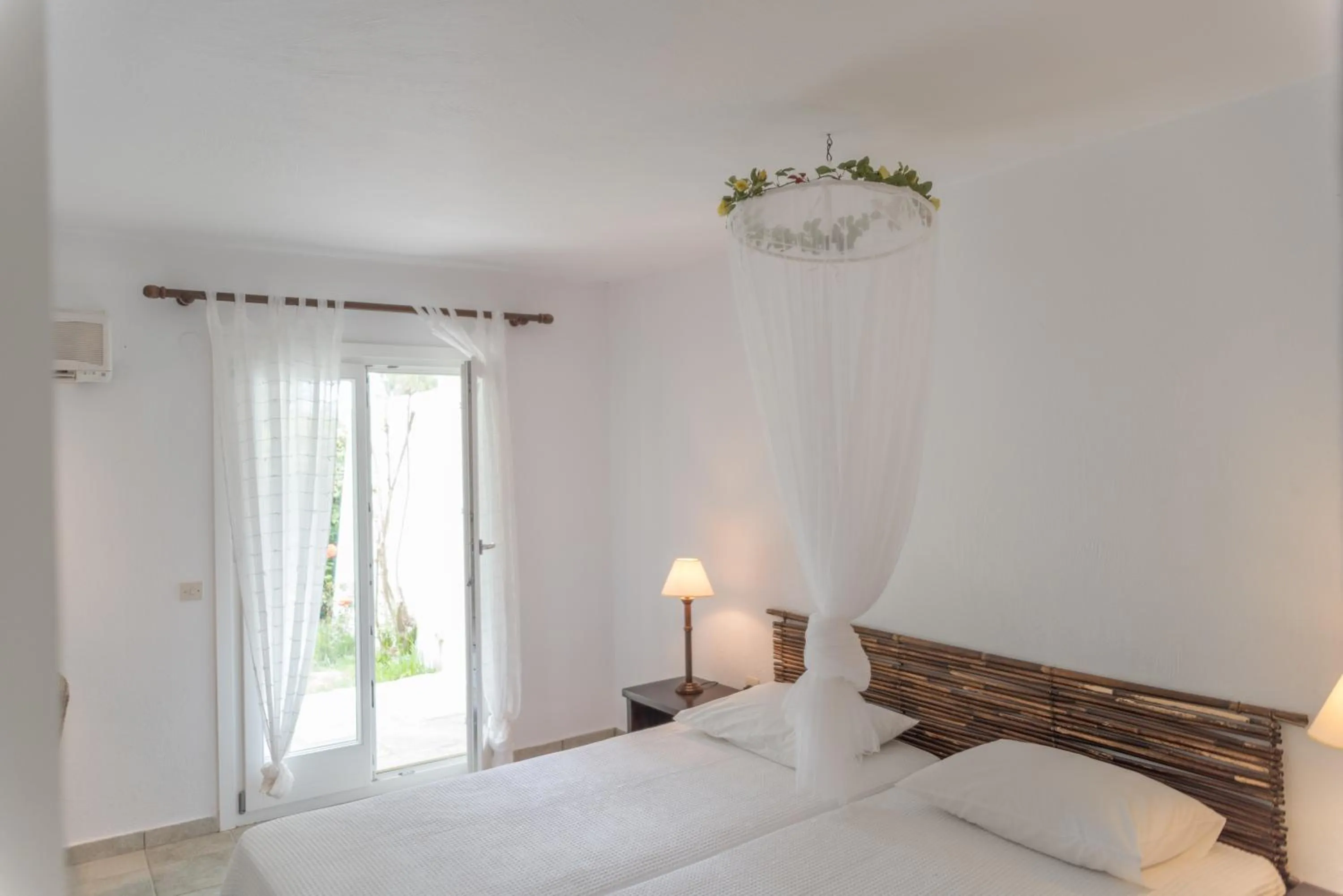 Bedroom, Bed in Skiathos Holidays Suites & Villas
