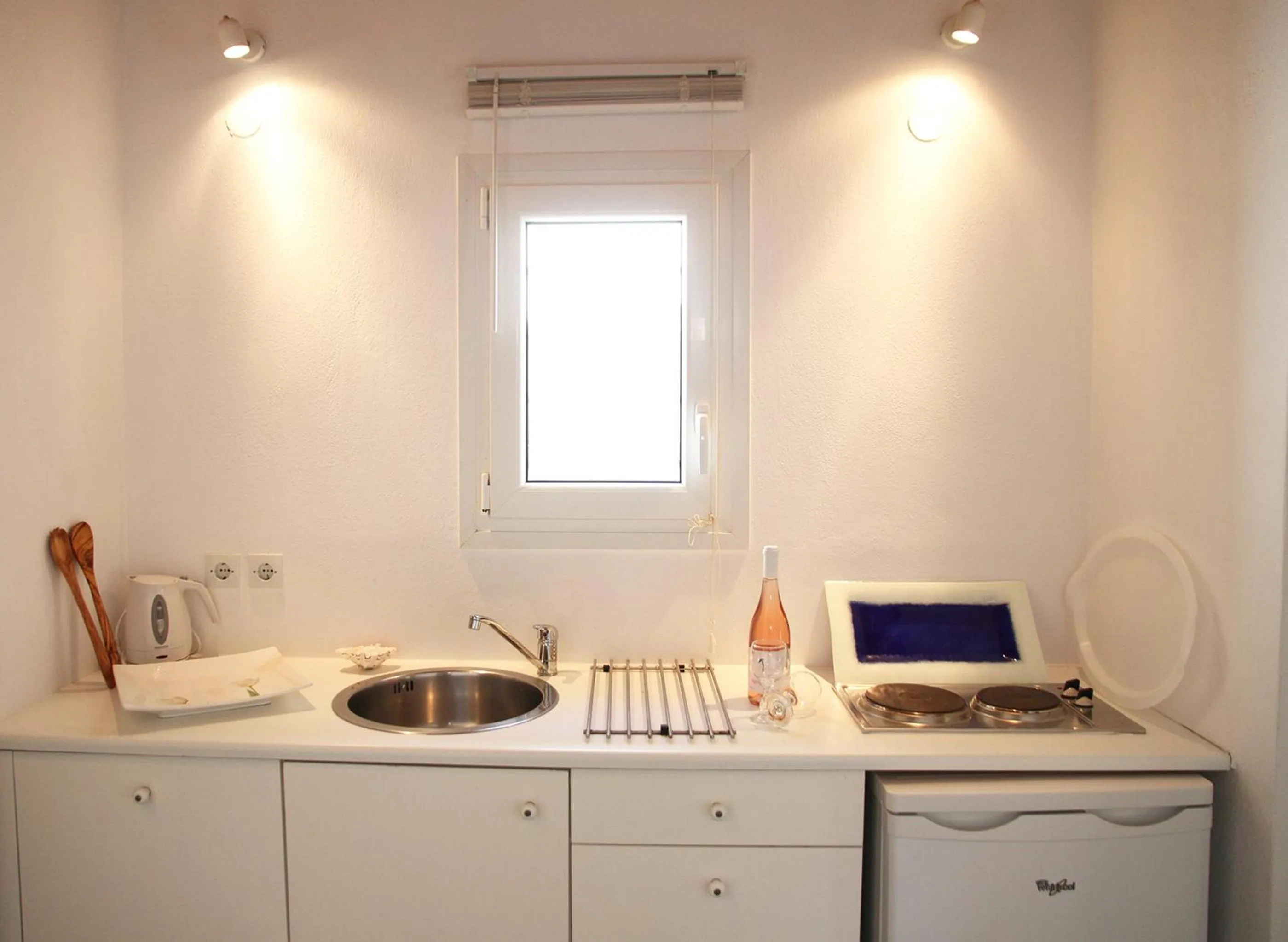 Kitchen or kitchenette in Skiathos Holidays Suites & Villas