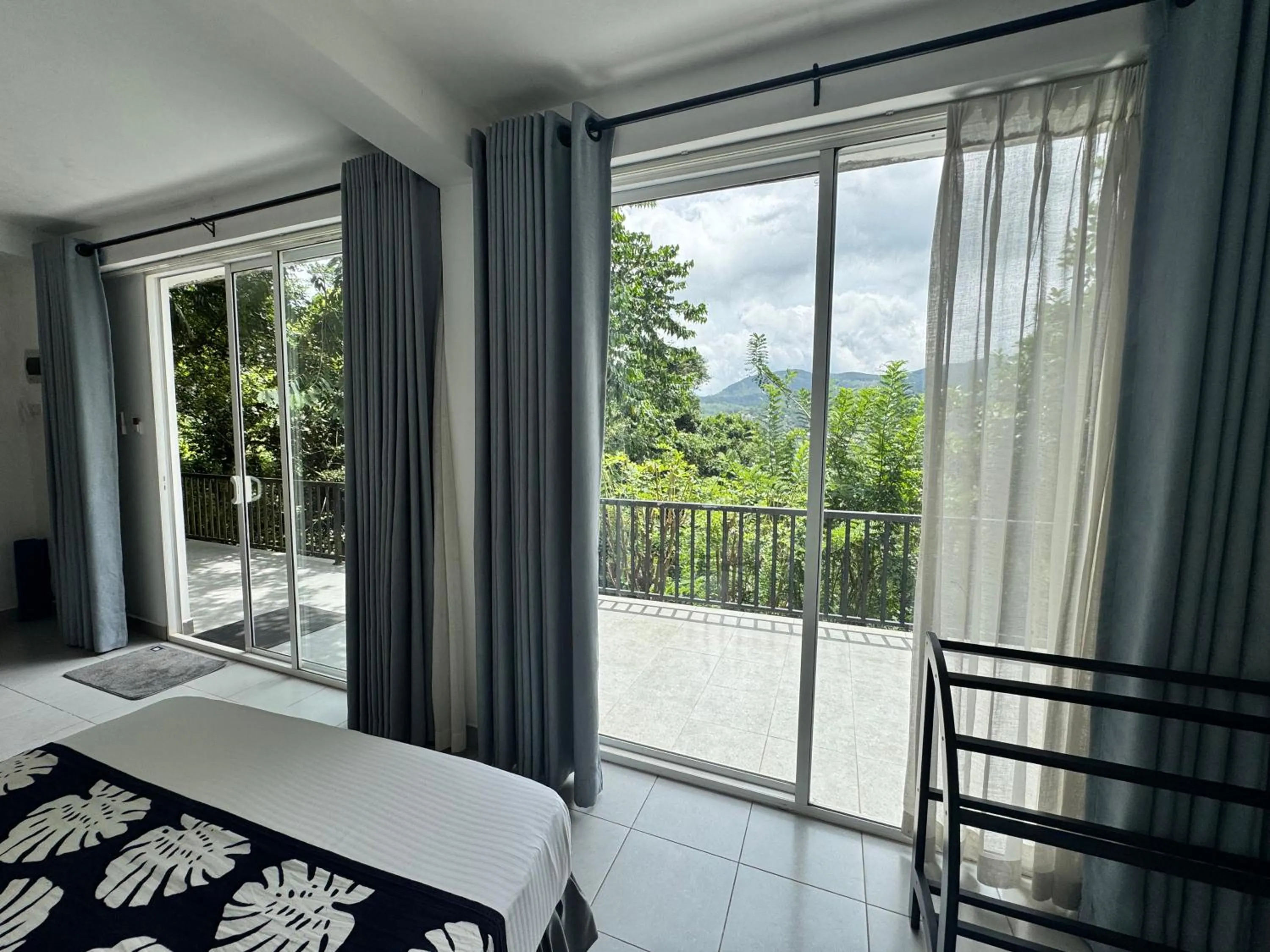 Photo of the whole room, Bed in Selyna Sky Terrace