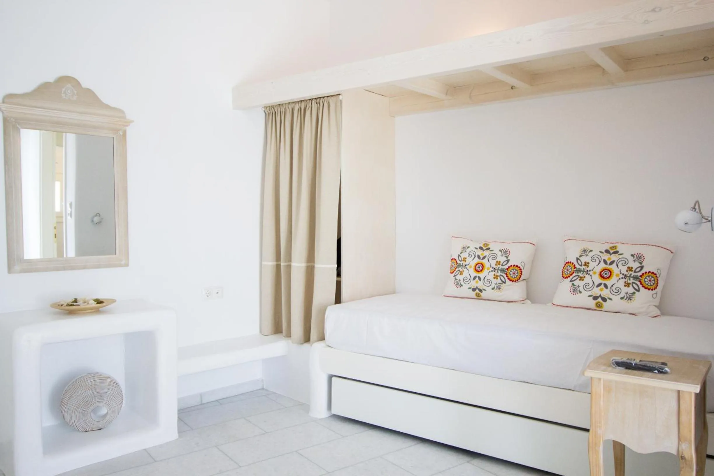 Bed in Aspasia Luxury Apartments