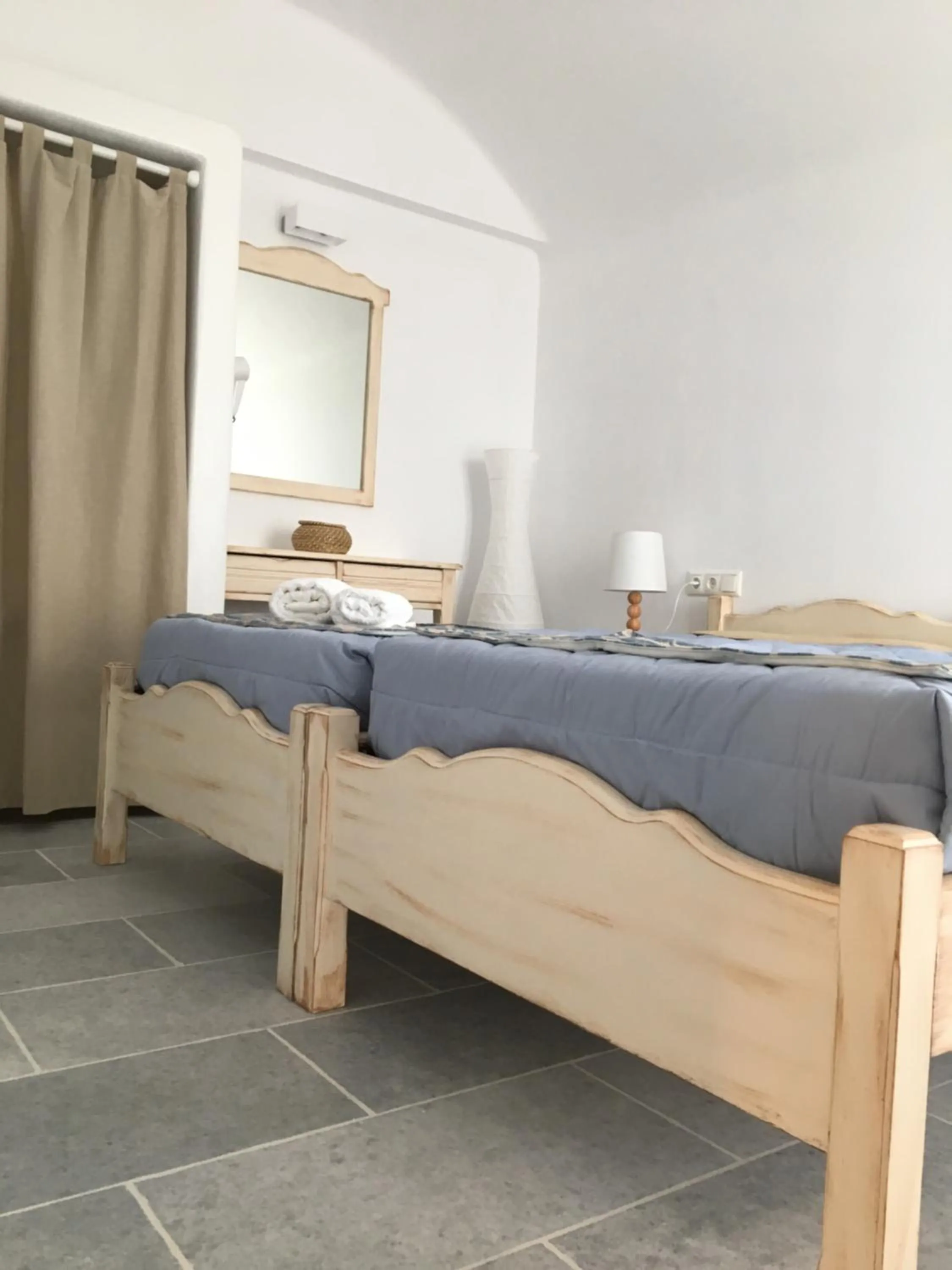 Bed in Aspasia Luxury Apartments