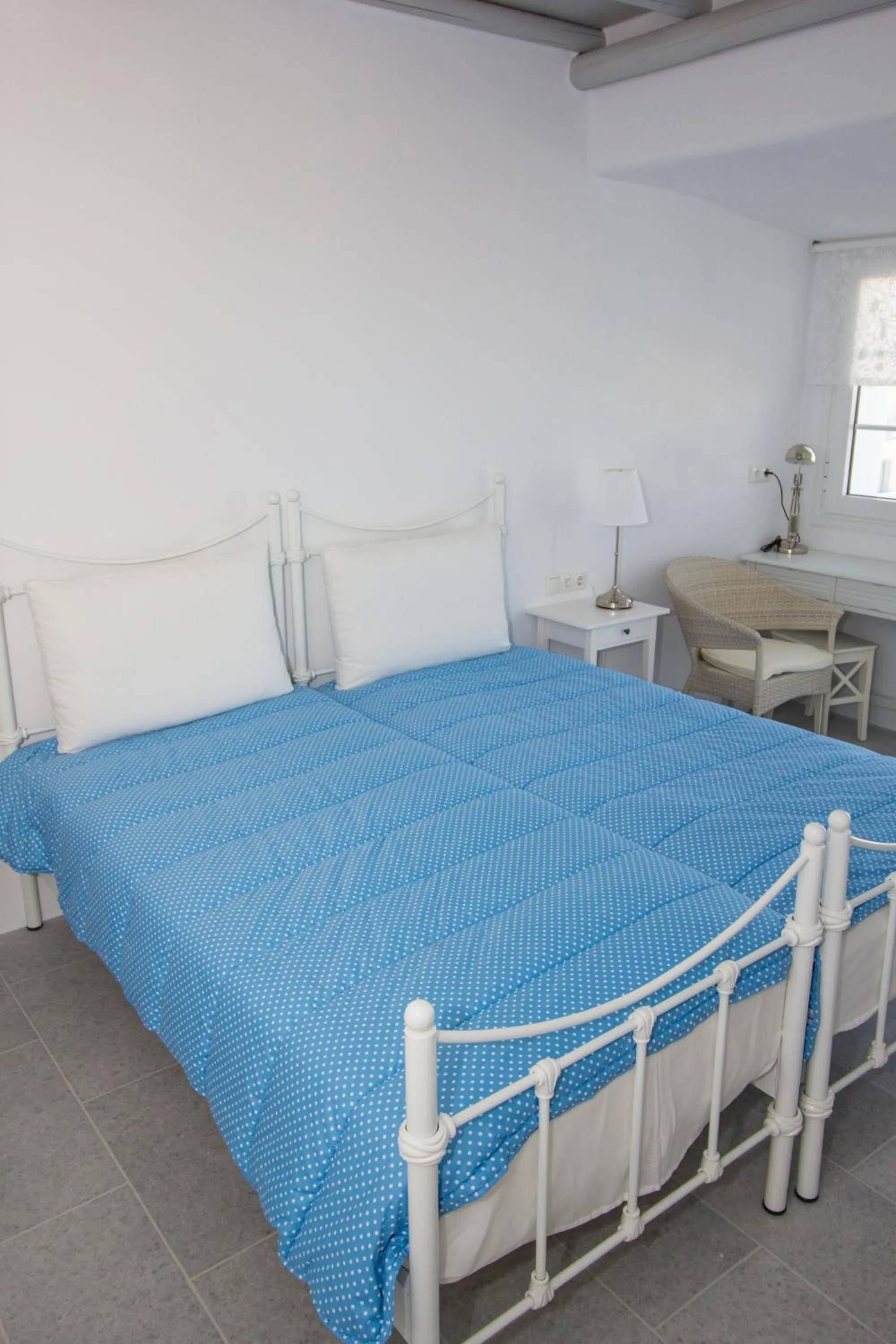 Bed in Aspasia Luxury Apartments