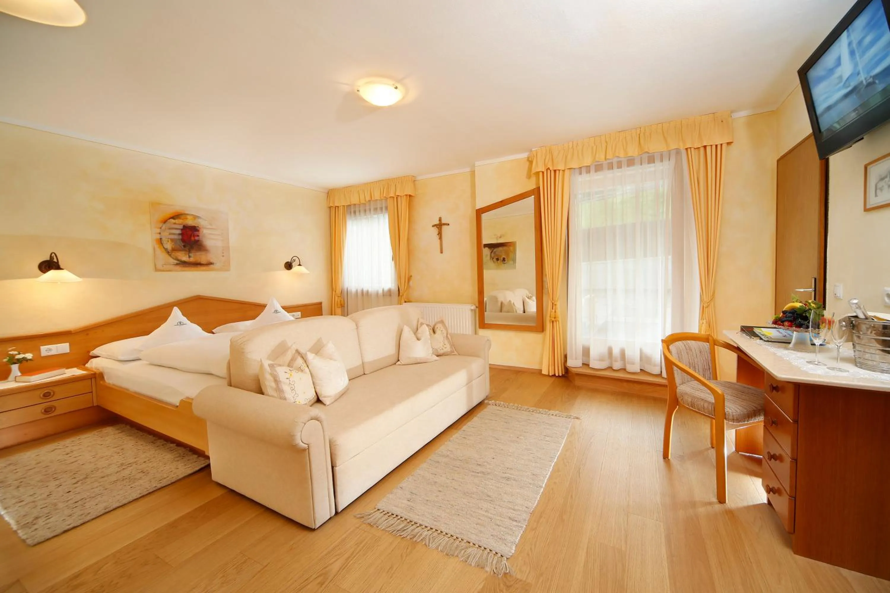 Photo of the whole room, Bed in Berglandhotel Untertheimerhof