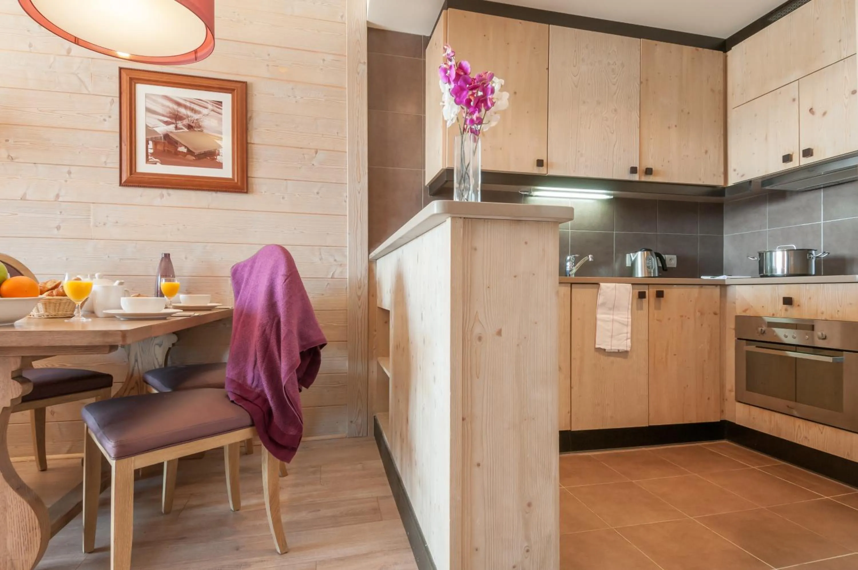Kitchen or kitchenette in Résidence Pierre & Vacances Premium L'Amara
