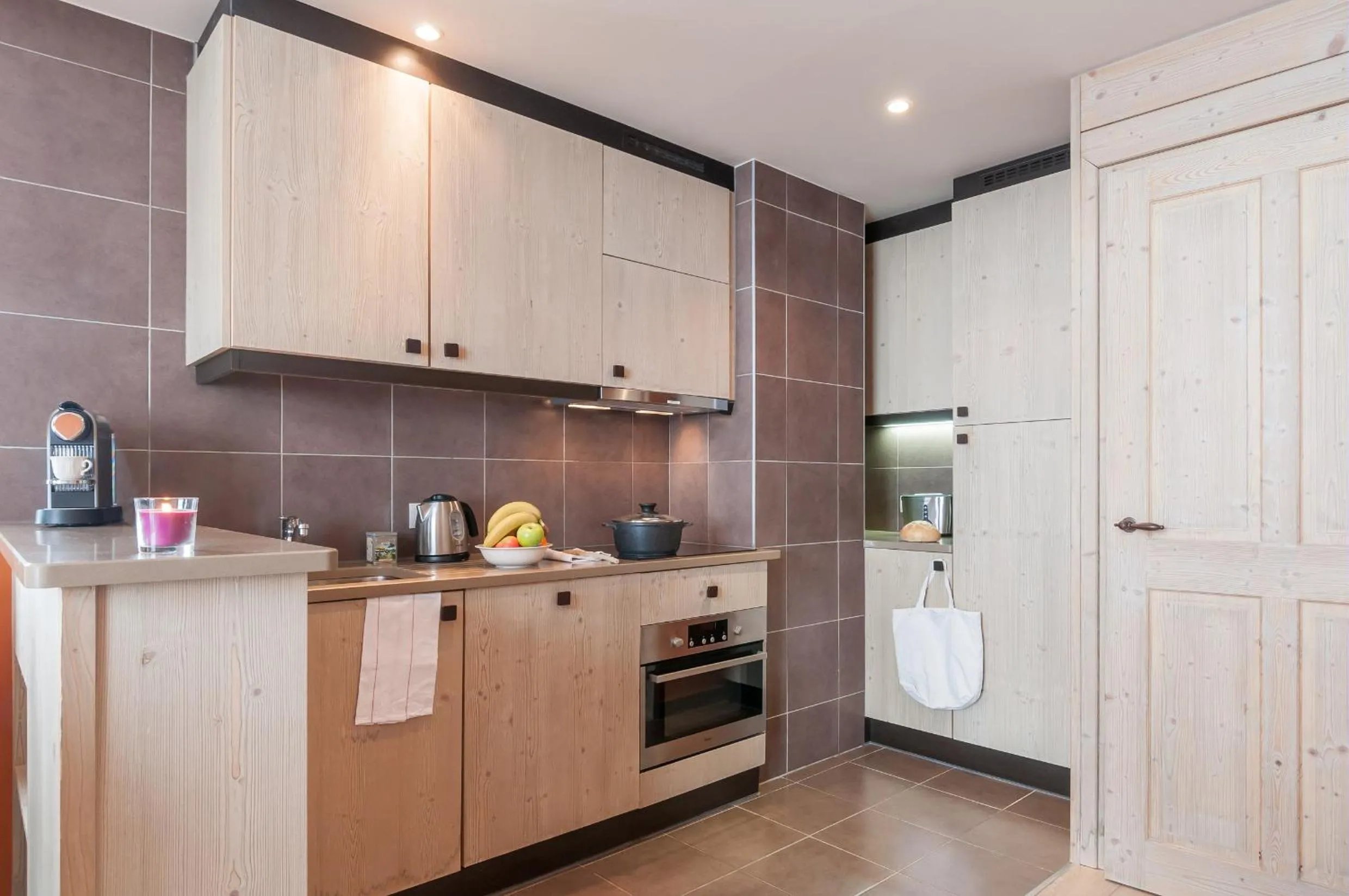 Kitchen or kitchenette in Résidence Pierre & Vacances Premium L'Amara