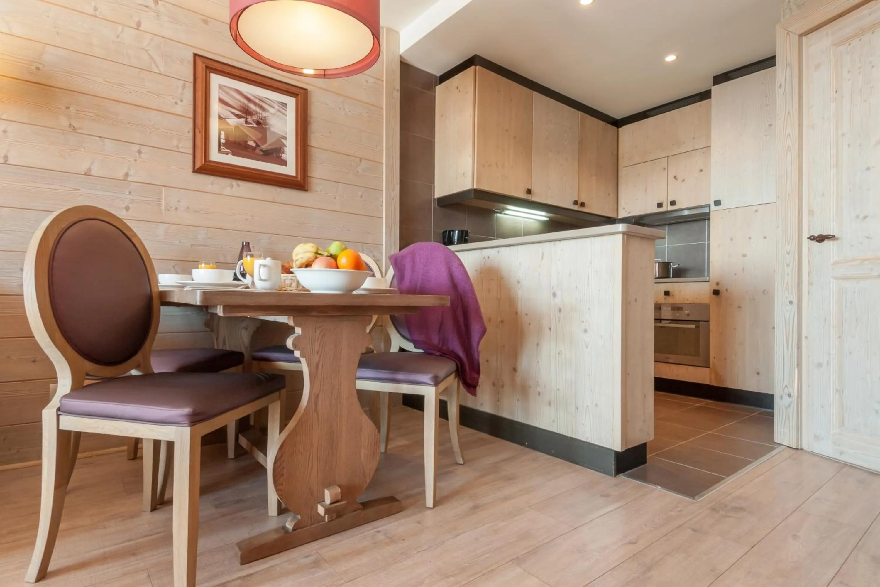 Kitchen or kitchenette in Résidence Pierre & Vacances Premium L'Amara
