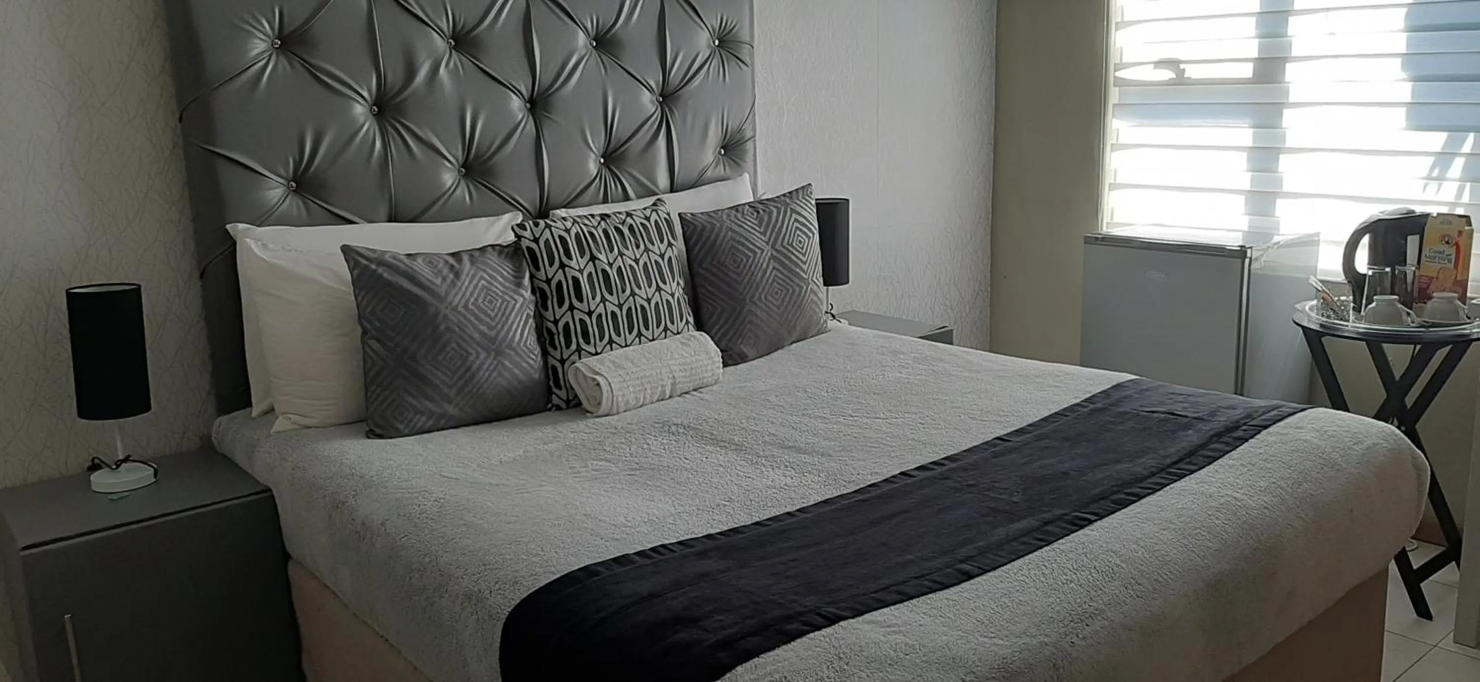 Bed in The New Mall Guesthouse