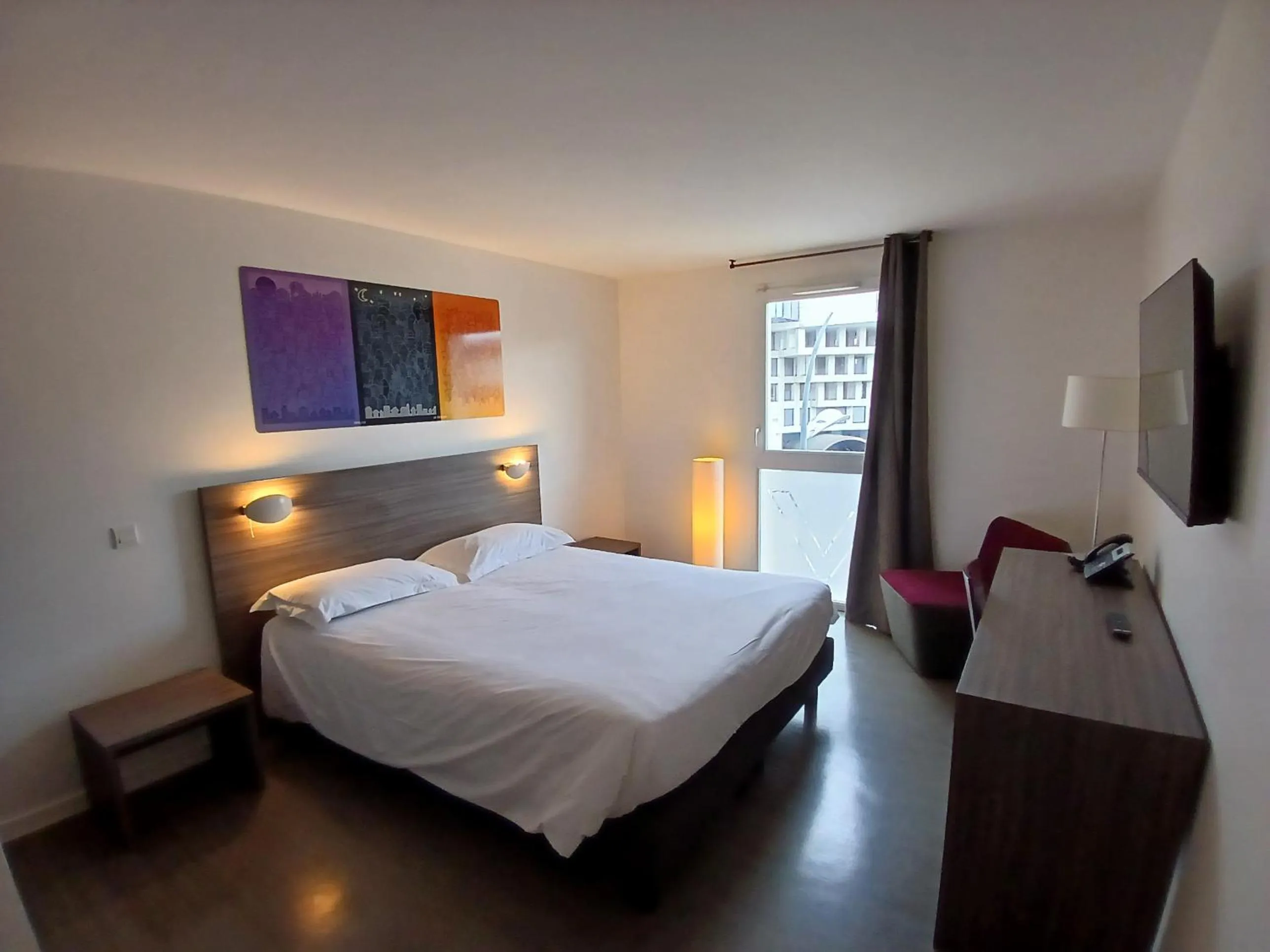 Kitchen or kitchenette, Bed in Appart’hôtel Hevea