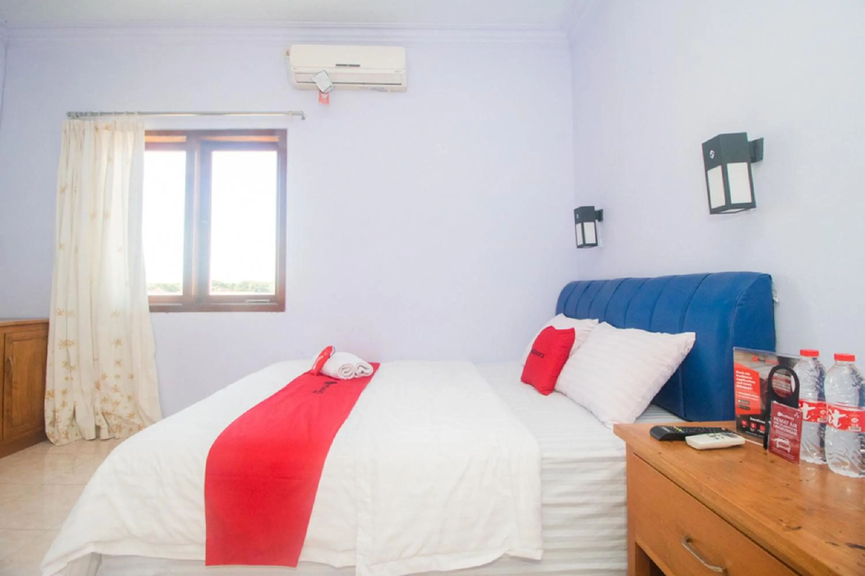 Bed in RedDoorz near Pantai Boom