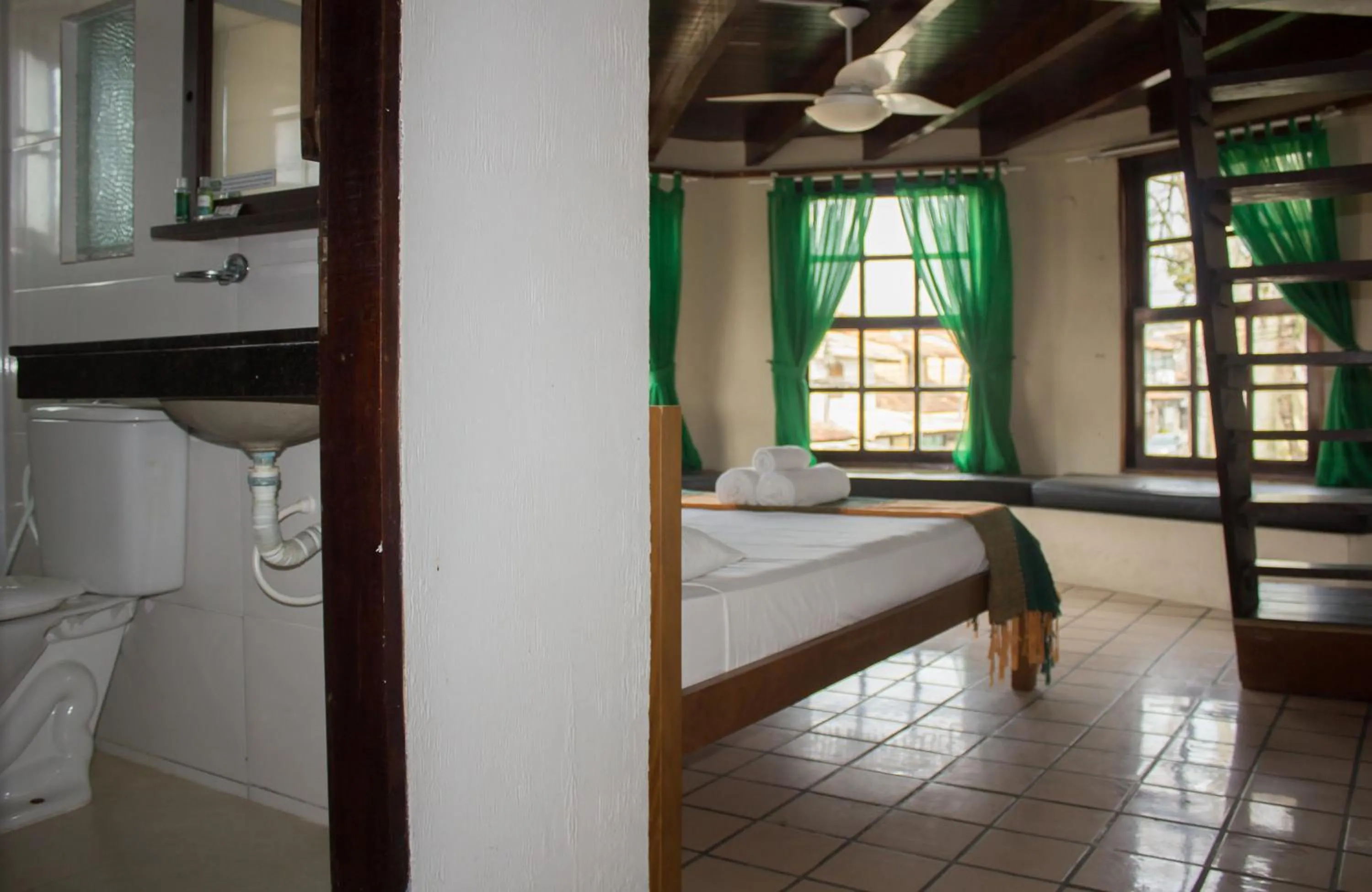 Classic Quadruple Room in Pousada Casa da Pedra