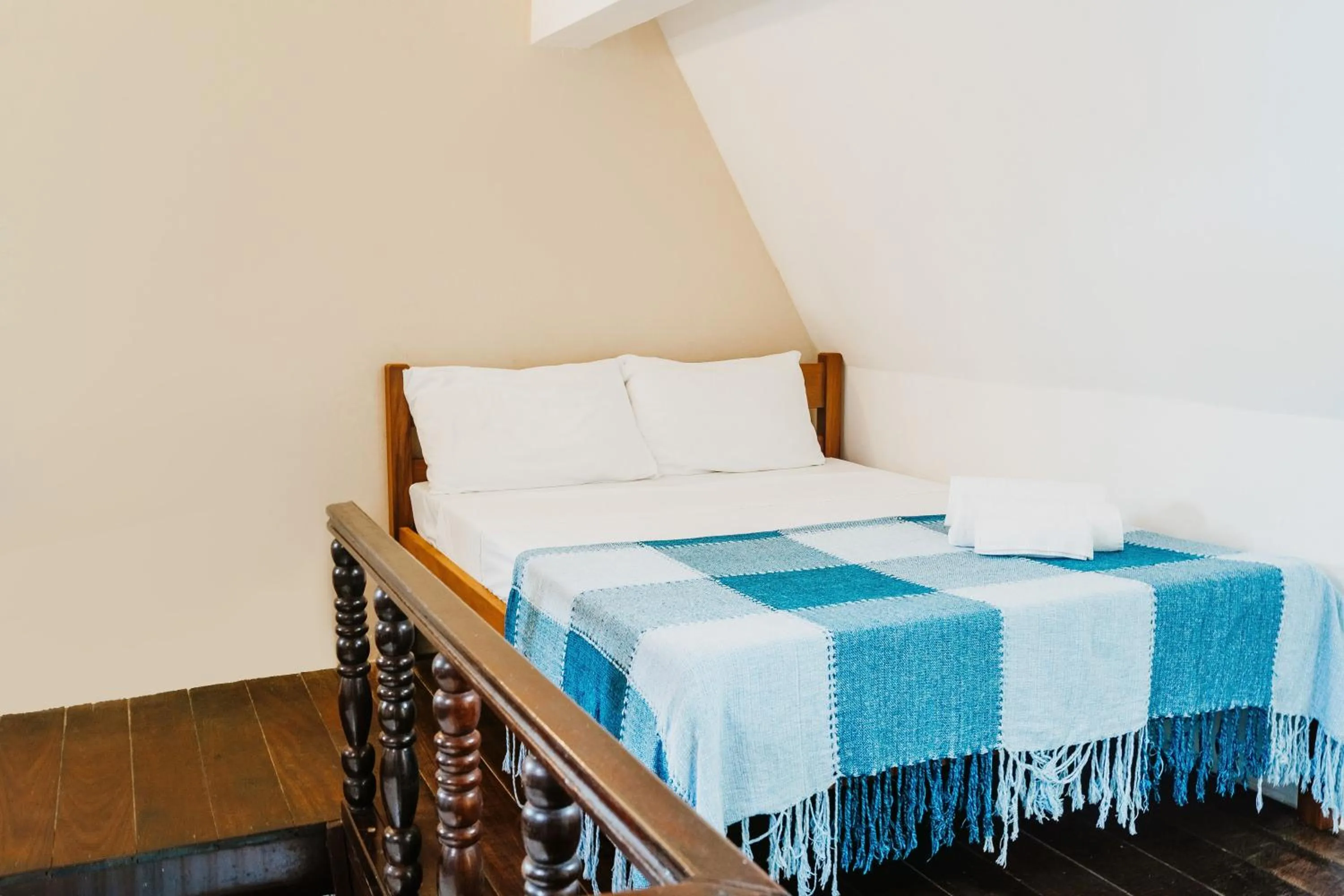 Bed in Pousada Casa da Pedra