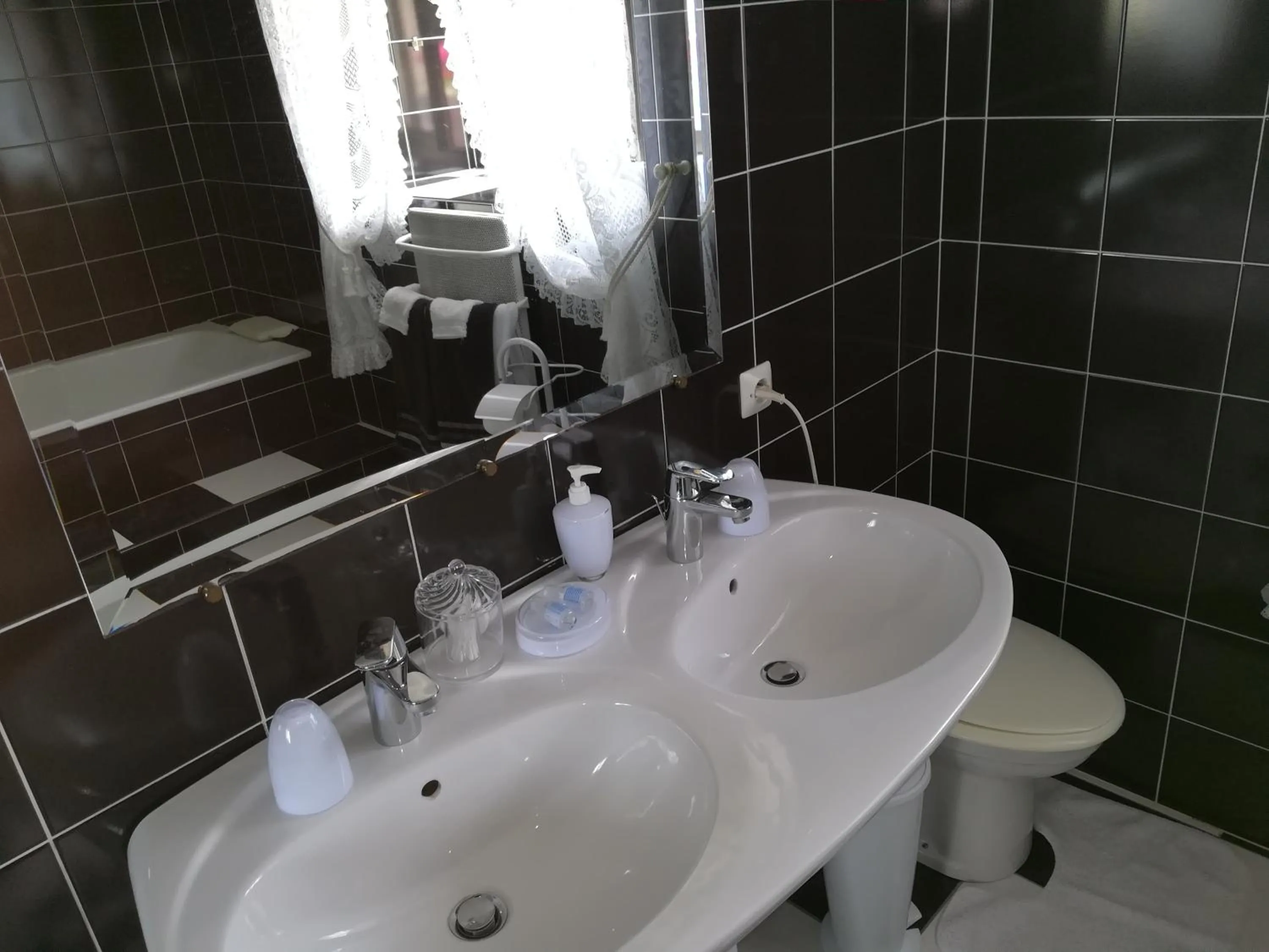 Bathroom in Chez Herveline Le Fer - Chambres et table d'hôtes