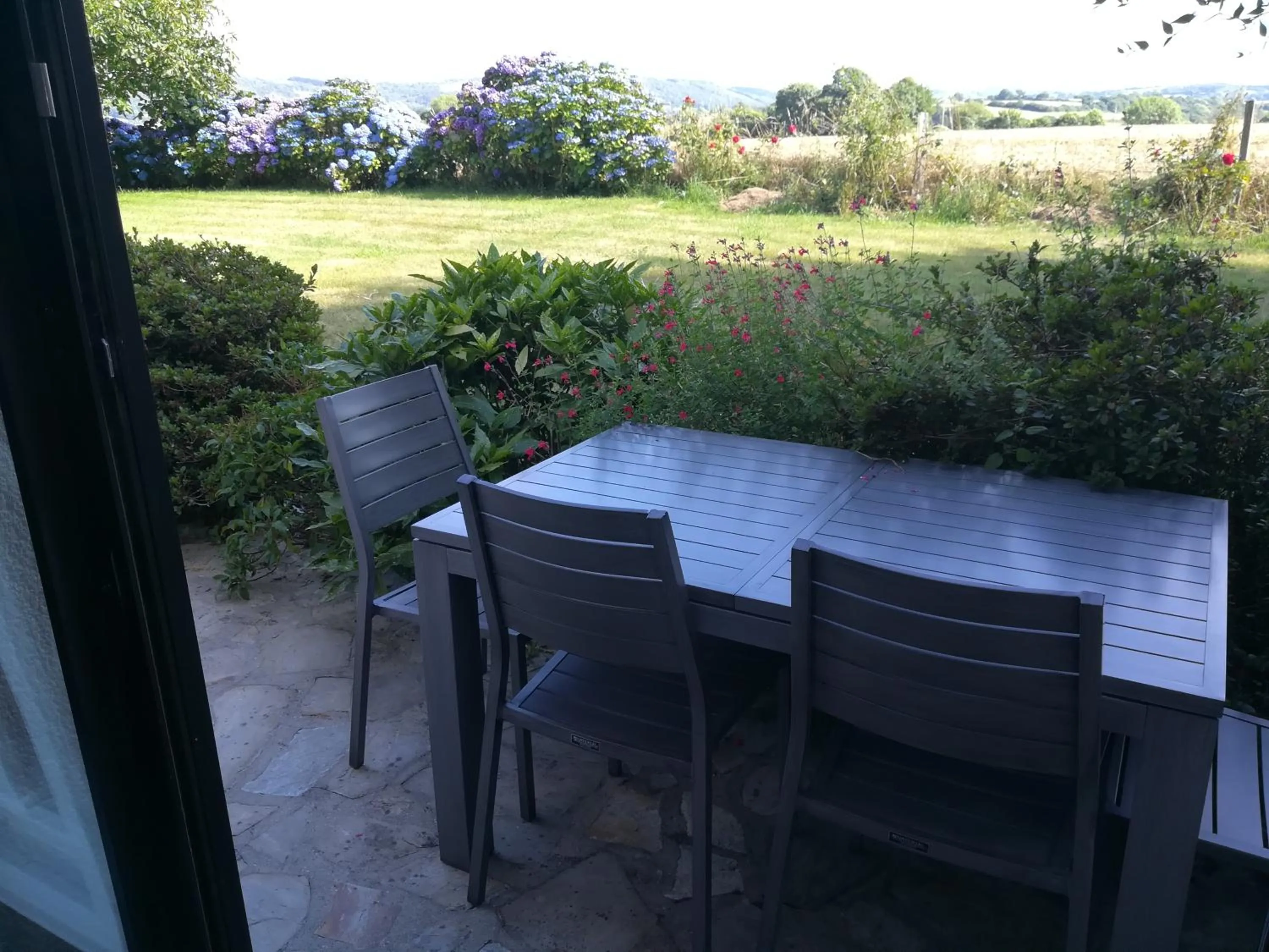 Garden view in Chez Herveline Le Fer - Chambres et table d'hôtes