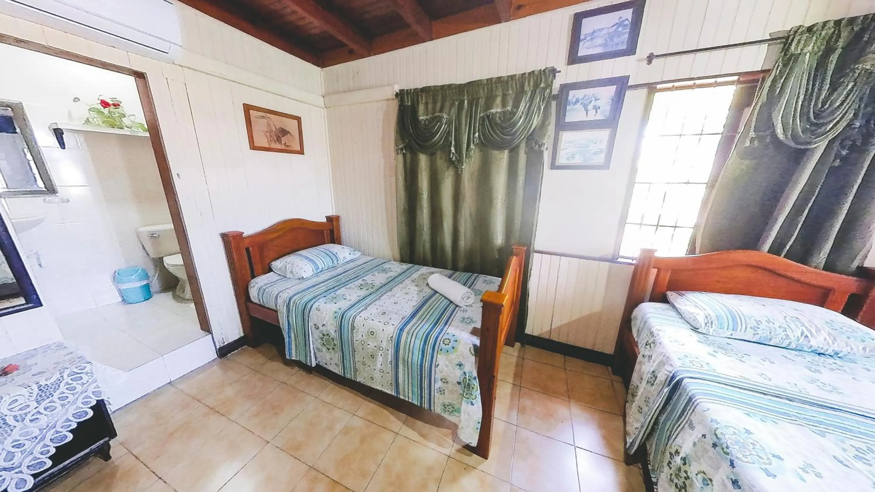 Bed in Posada Nativa Miss Trinie