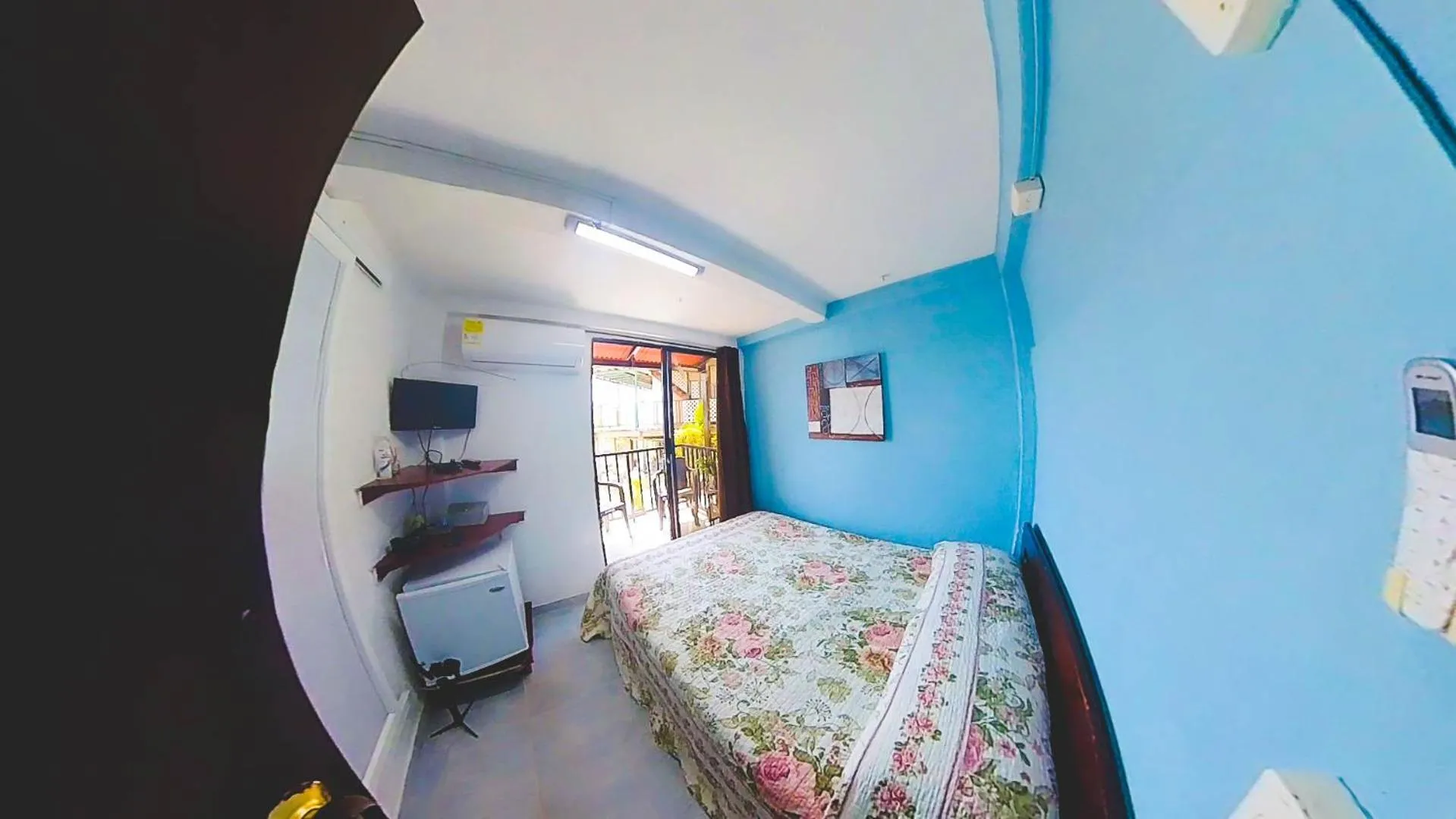 Bed in Posada Nativa Miss Trinie