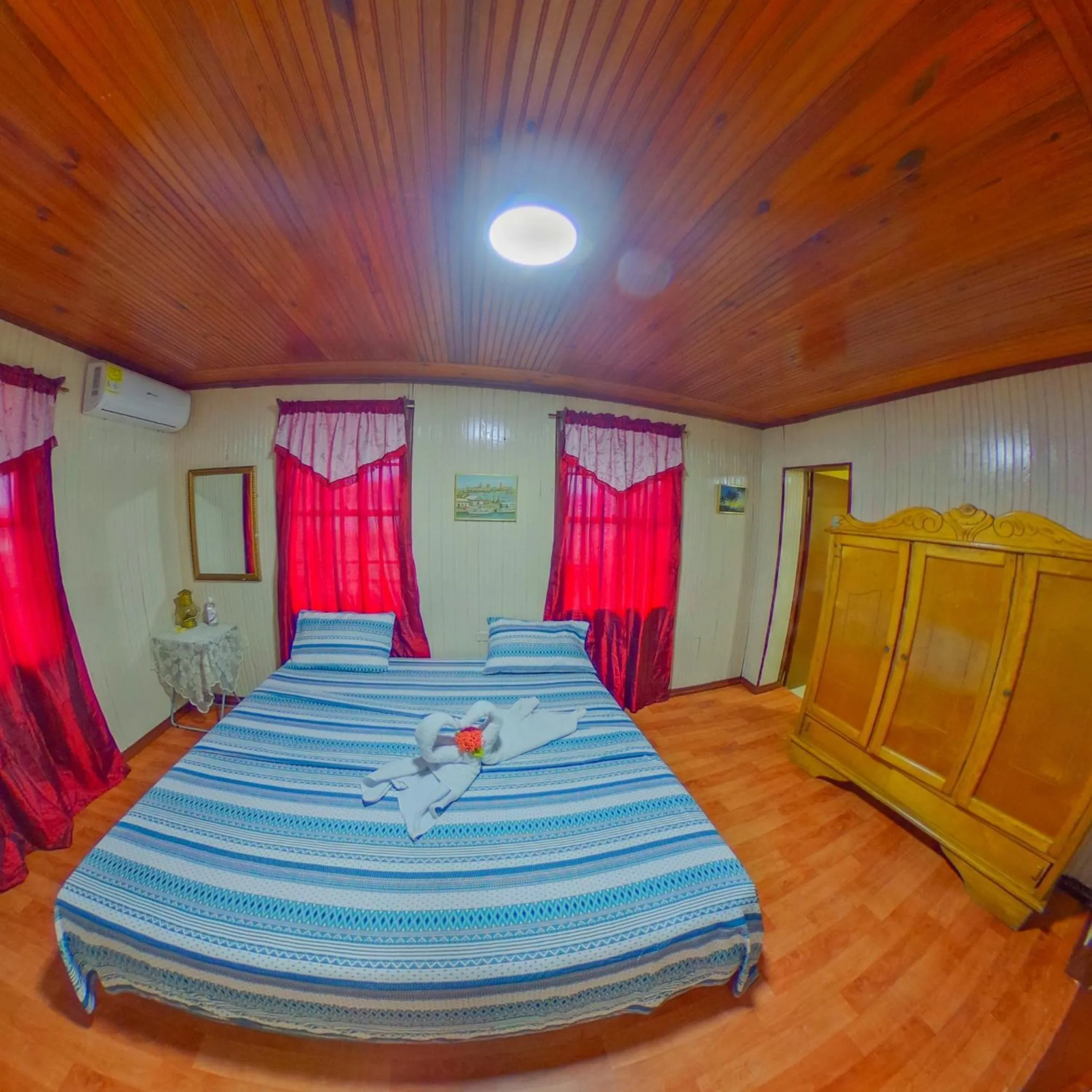 Bed in Posada Nativa Miss Trinie