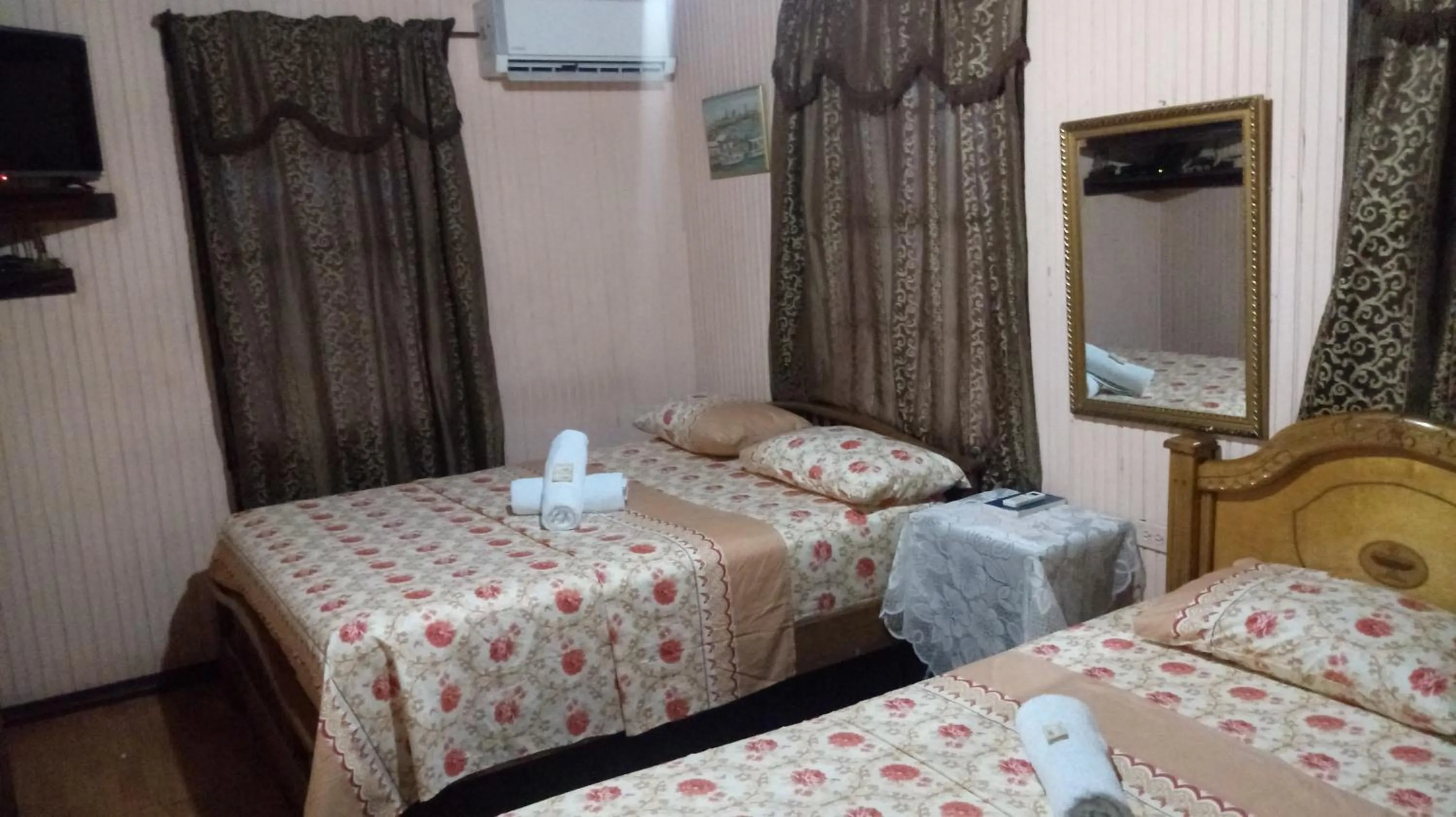 Bed in Posada Nativa Miss Trinie