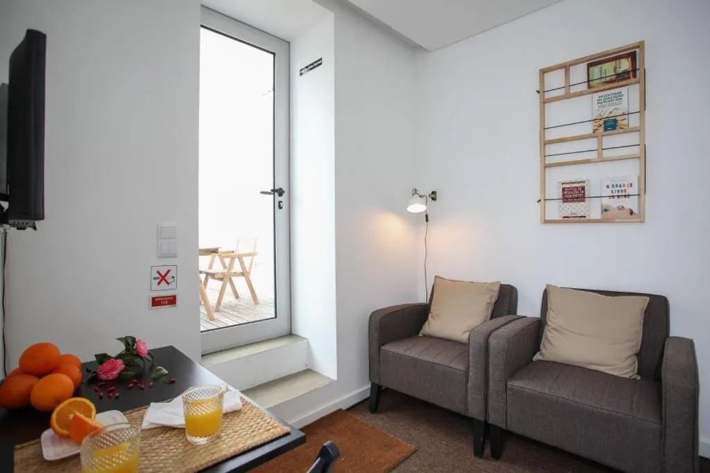 Living room in Place Of Moments Urban-Suites