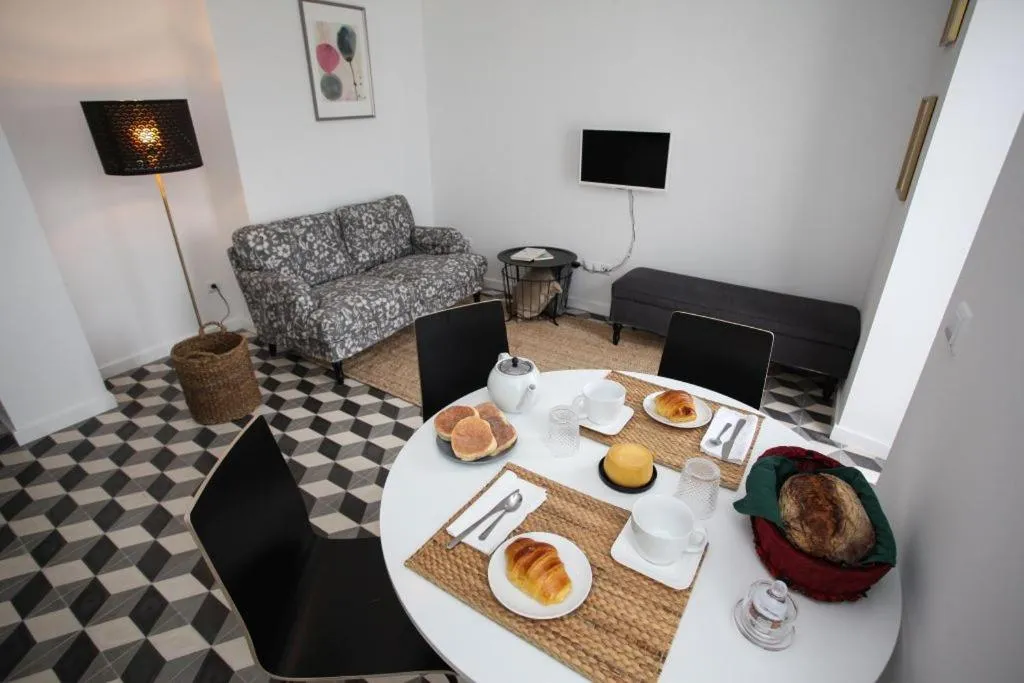 Dining area in Place Of Moments Urban-Suites