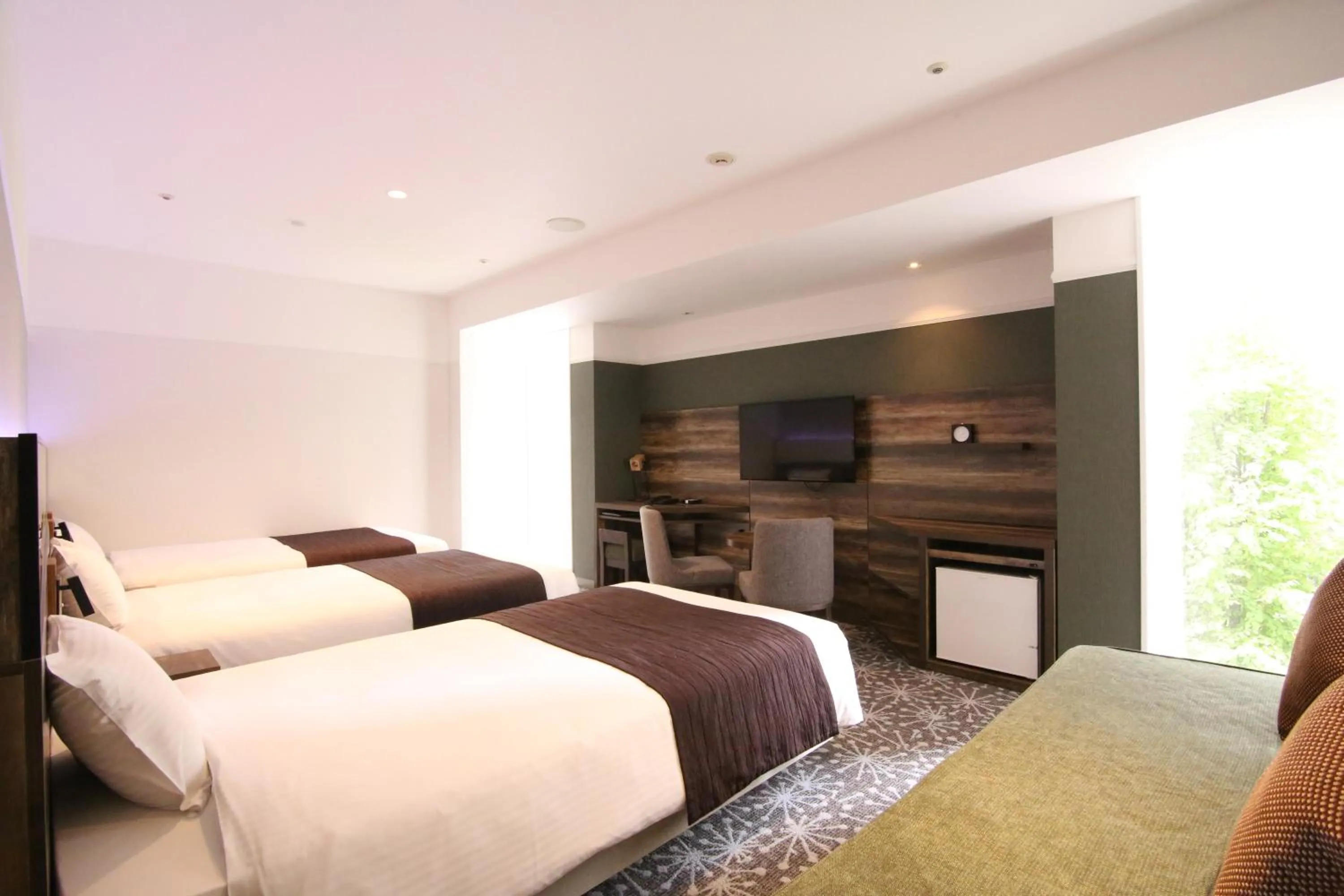 Photo of the whole room, Bed in Quintessa Hotel Sapporo