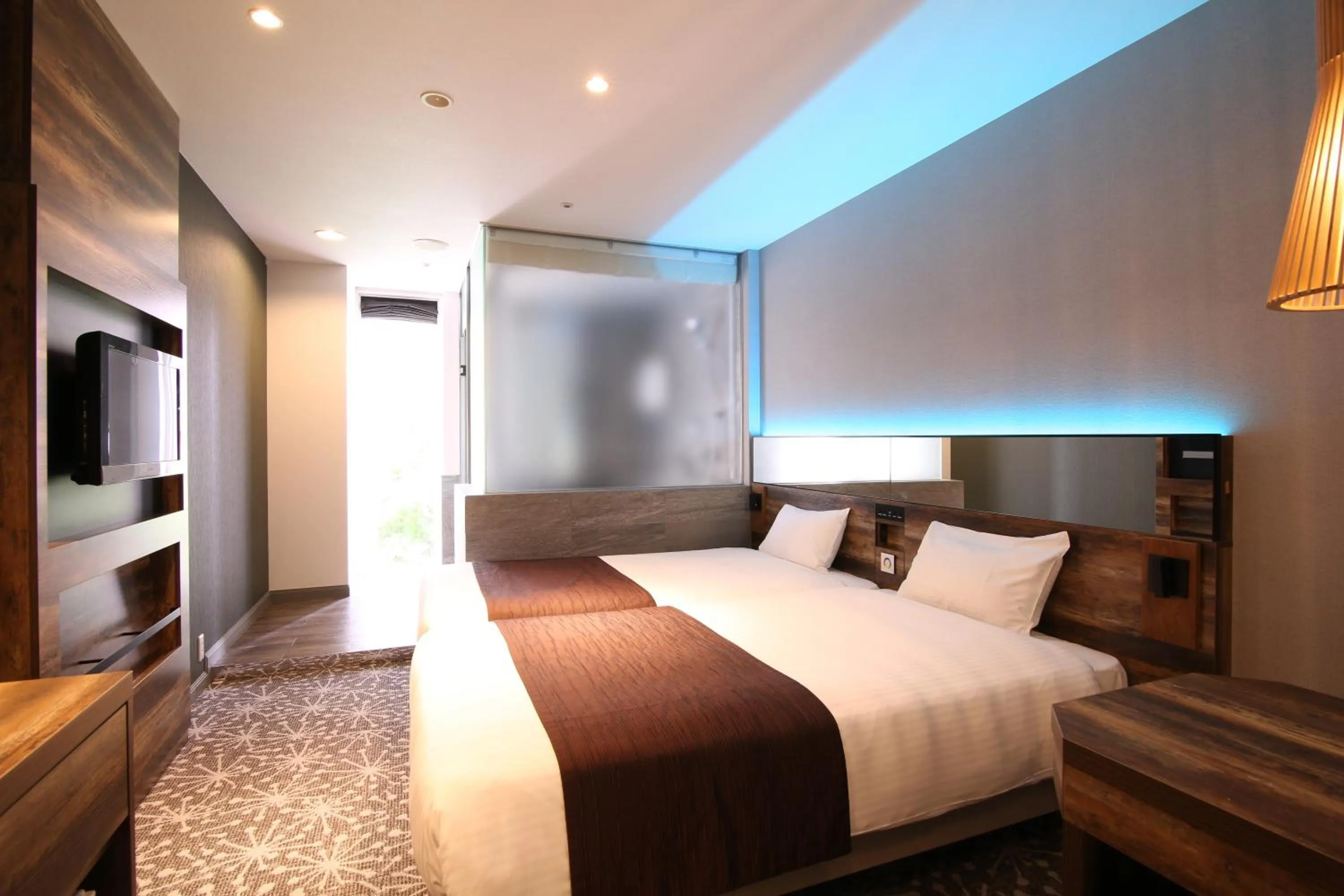 Photo of the whole room, Bed in Quintessa Hotel Sapporo