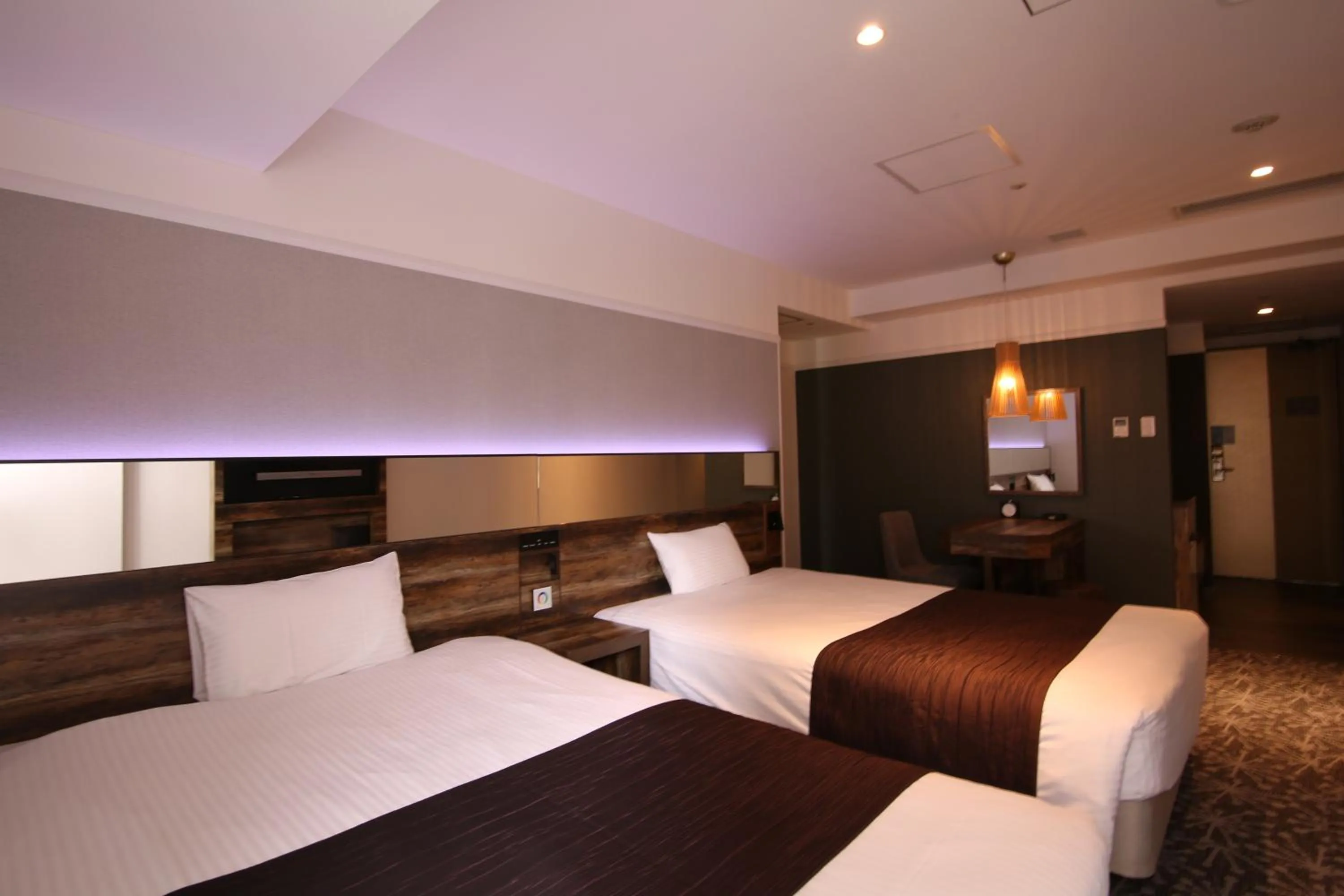 Photo of the whole room, Bed in Quintessa Hotel Sapporo