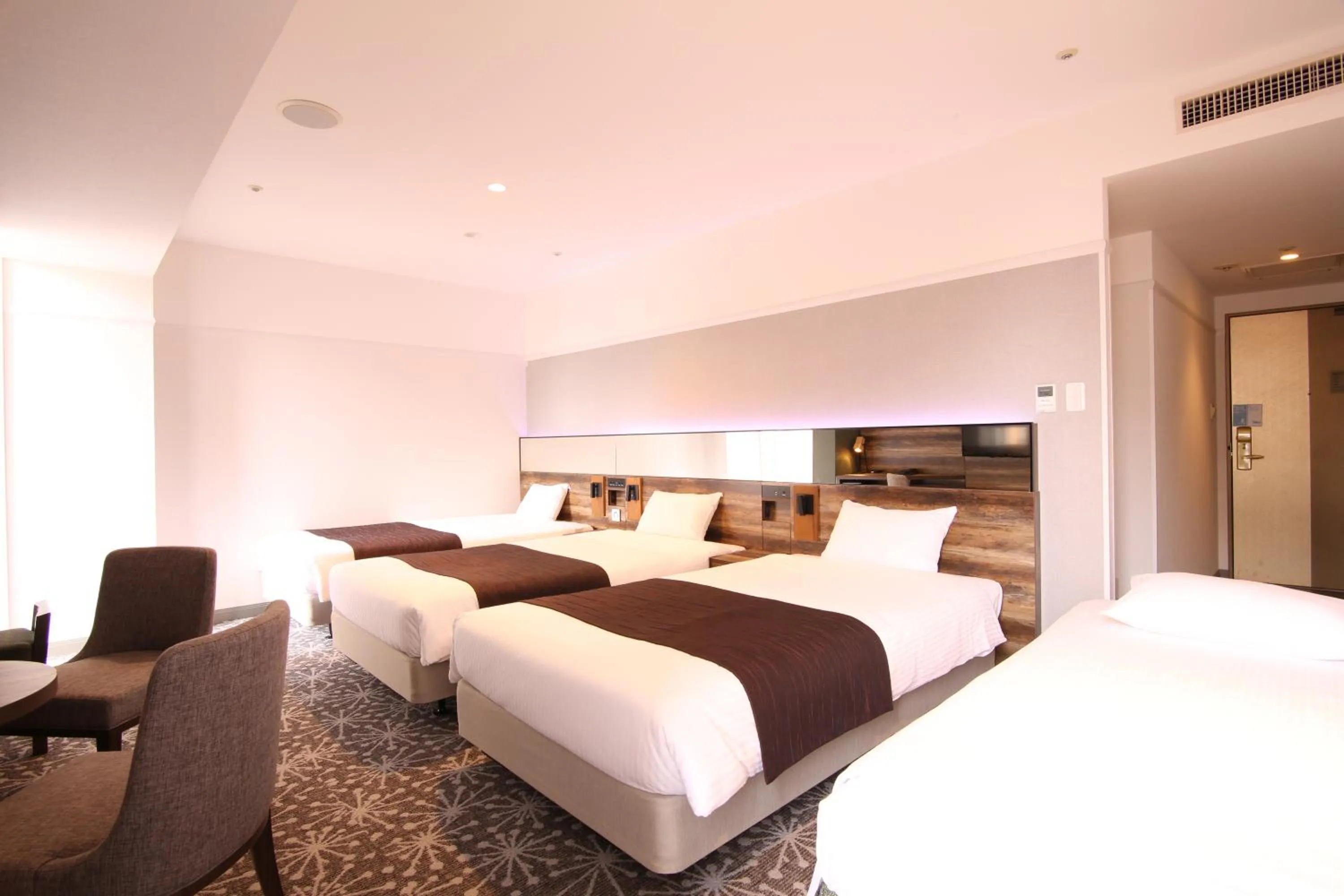 Photo of the whole room, Bed in Quintessa Hotel Sapporo