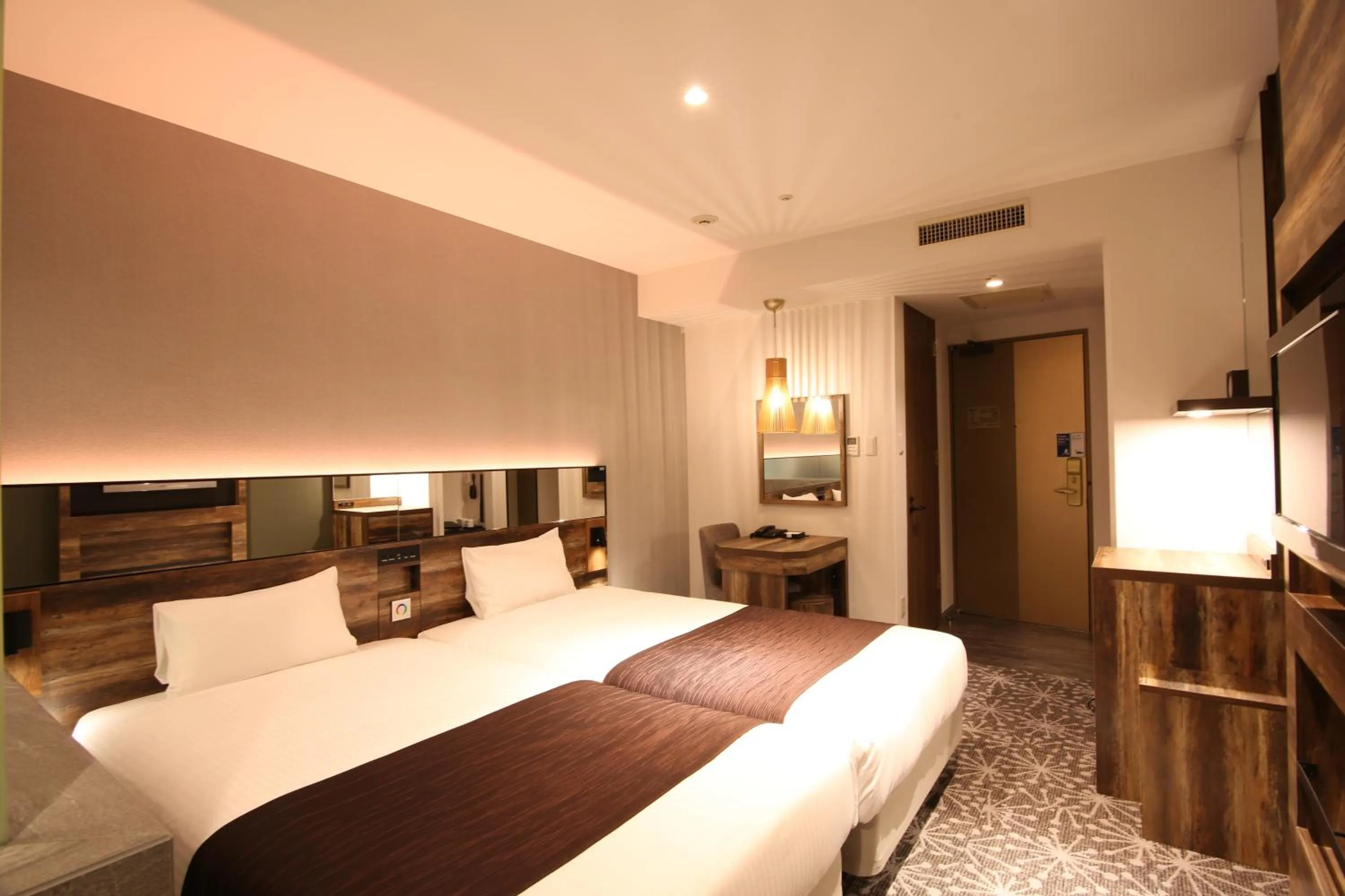 Photo of the whole room, Bed in Quintessa Hotel Sapporo