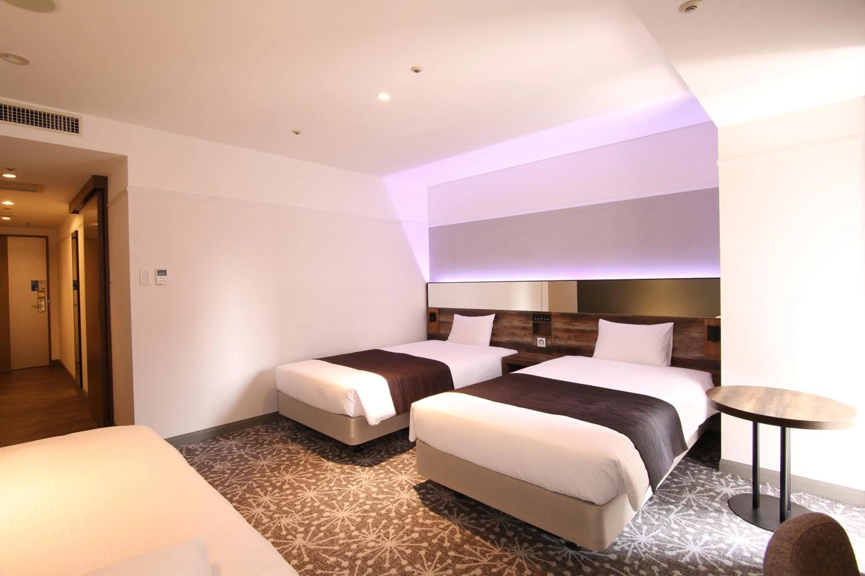 Photo of the whole room, Bed in Quintessa Hotel Sapporo