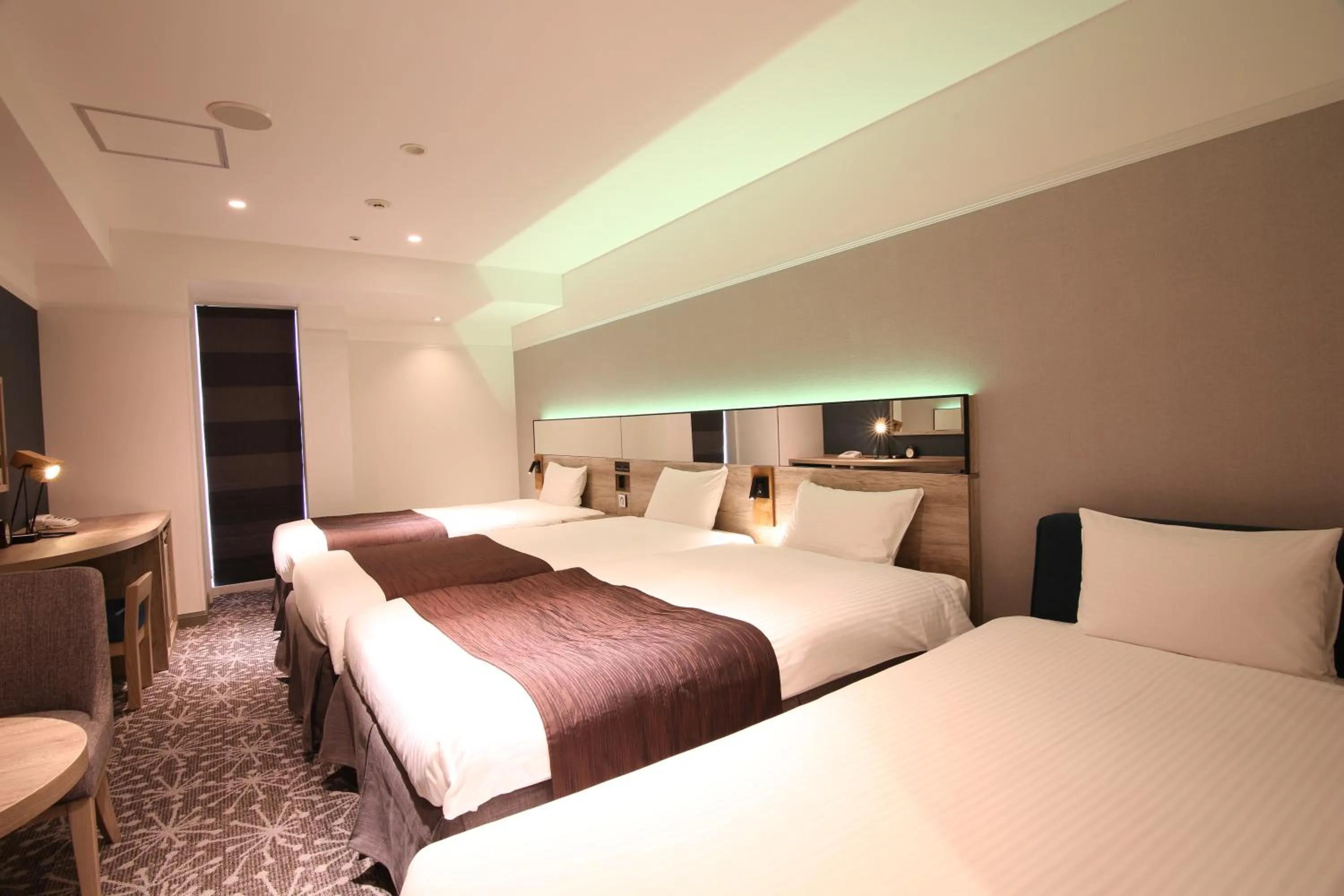 Photo of the whole room, Bed in Quintessa Hotel Sapporo