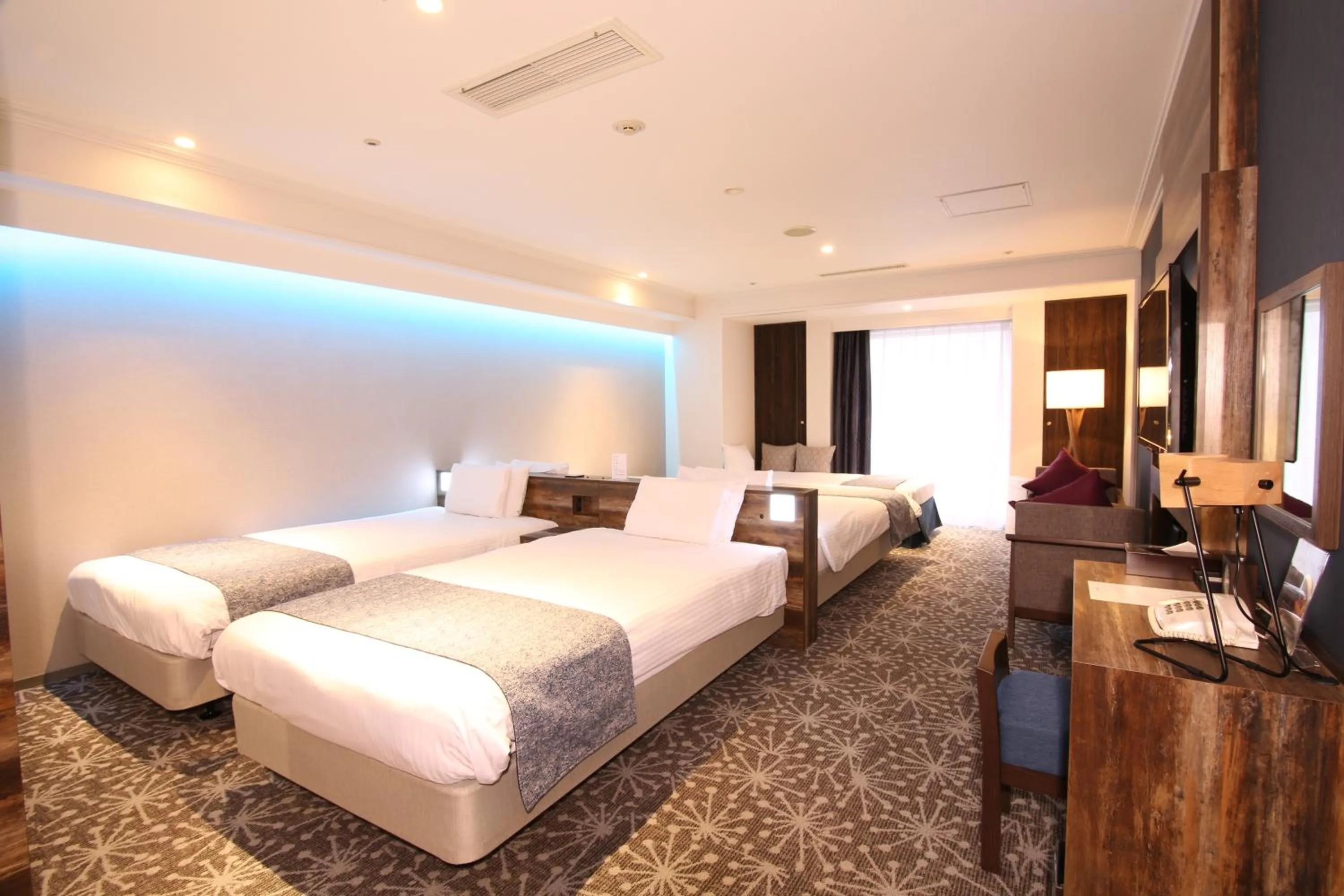 Photo of the whole room, Bed in Quintessa Hotel Sapporo