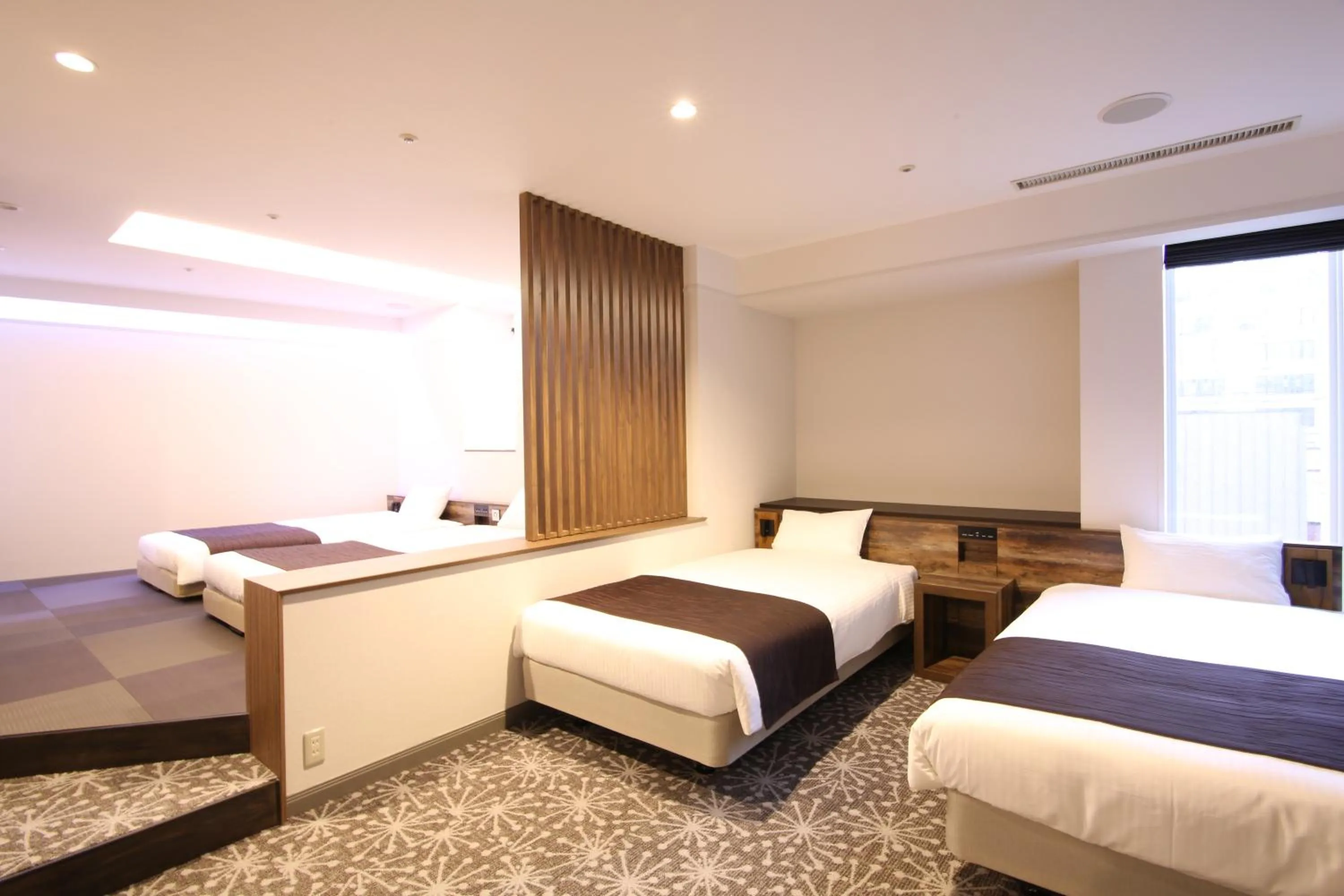 Photo of the whole room, Bed in Quintessa Hotel Sapporo