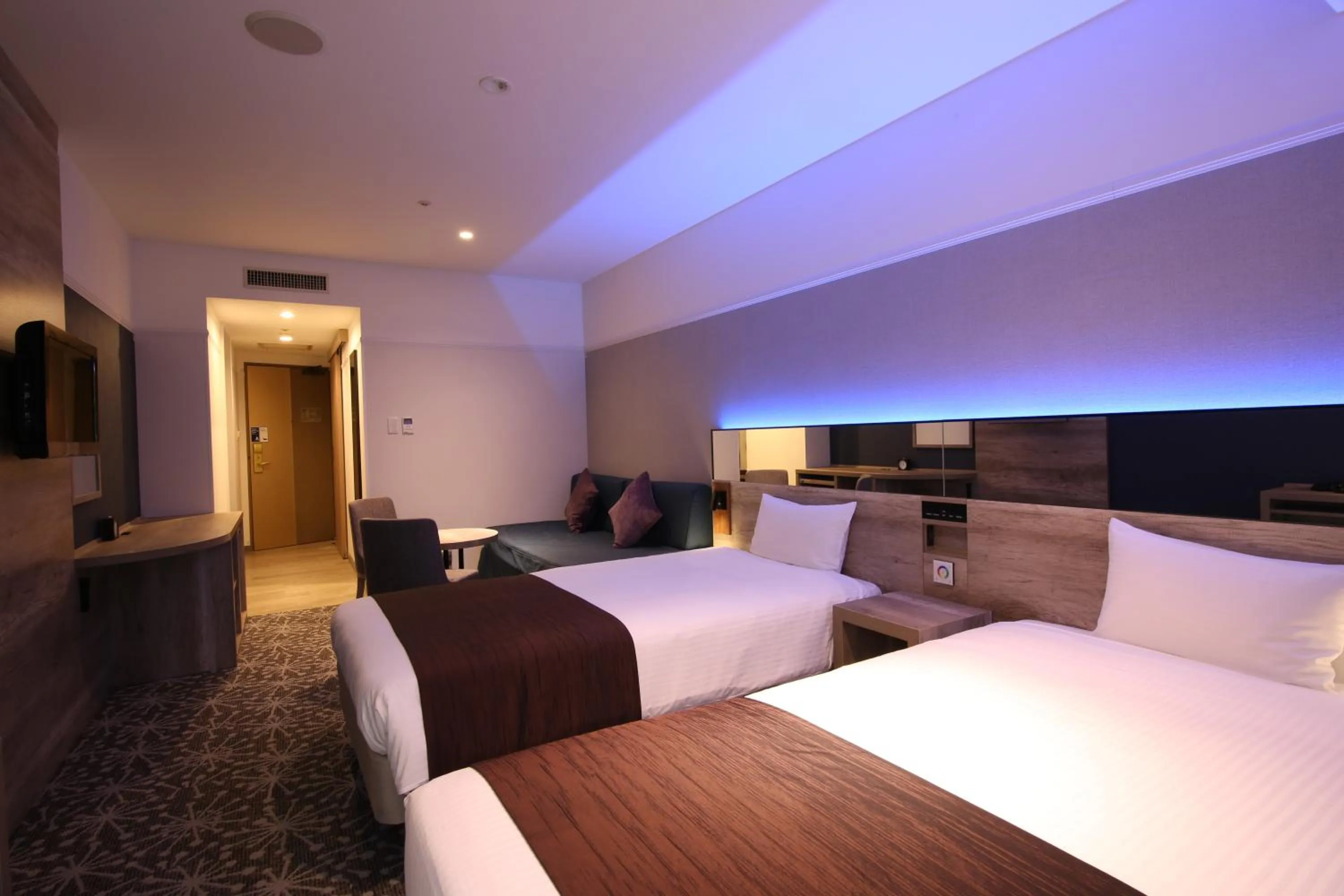 Photo of the whole room, Bed in Quintessa Hotel Sapporo