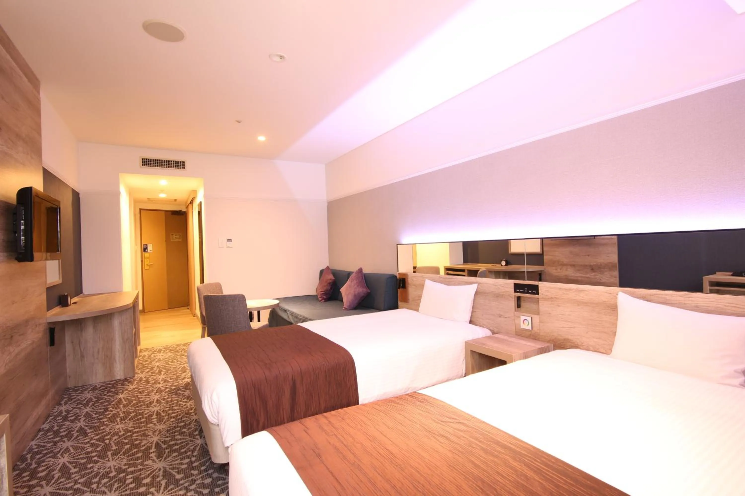 Photo of the whole room, Bed in Quintessa Hotel Sapporo