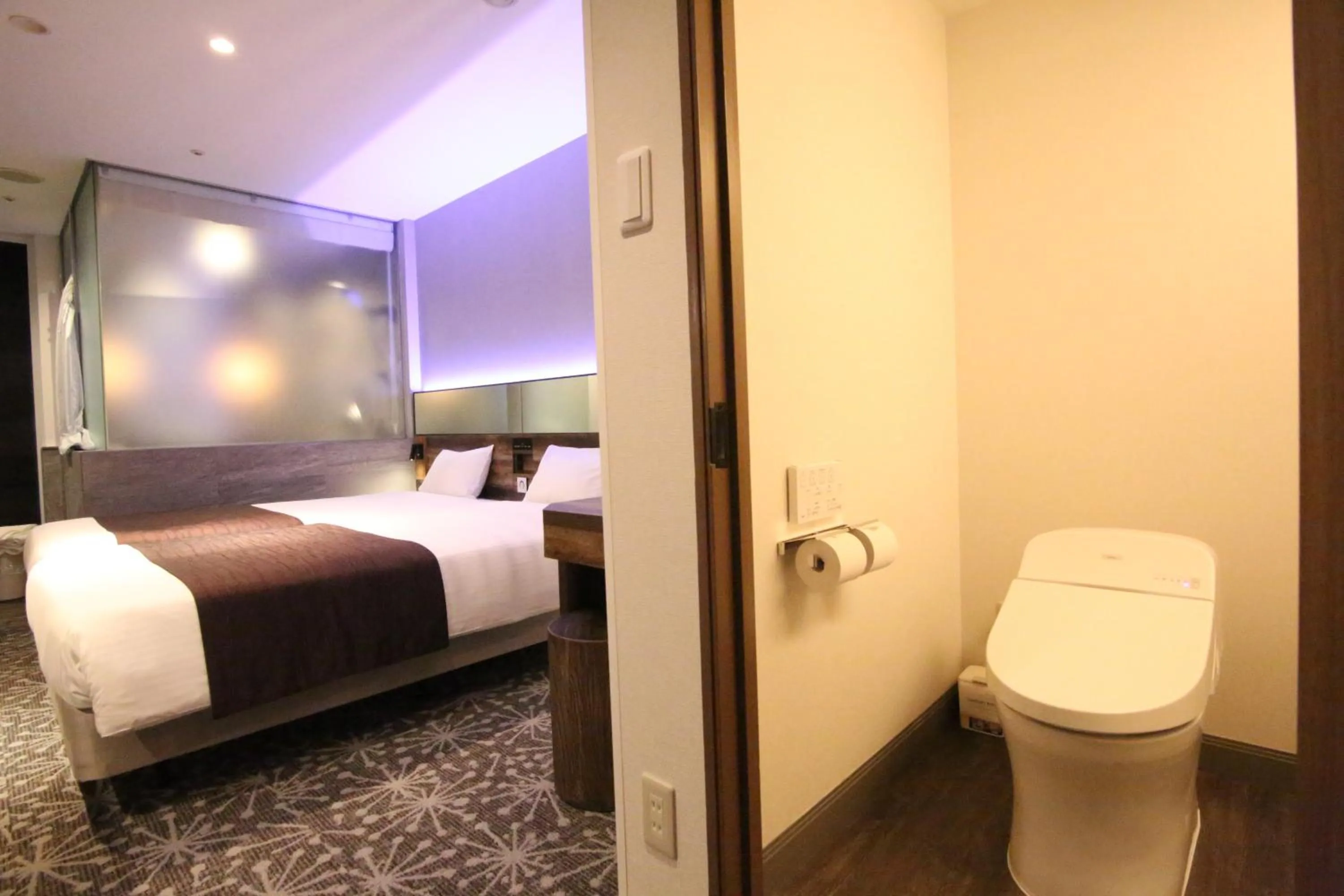 Toilet, Bed in Quintessa Hotel Sapporo