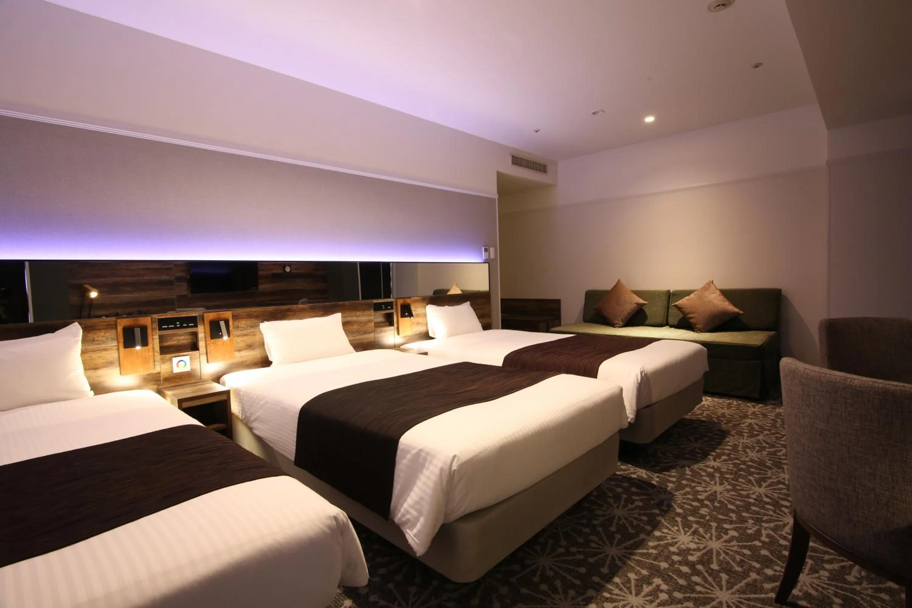 Photo of the whole room, Bed in Quintessa Hotel Sapporo