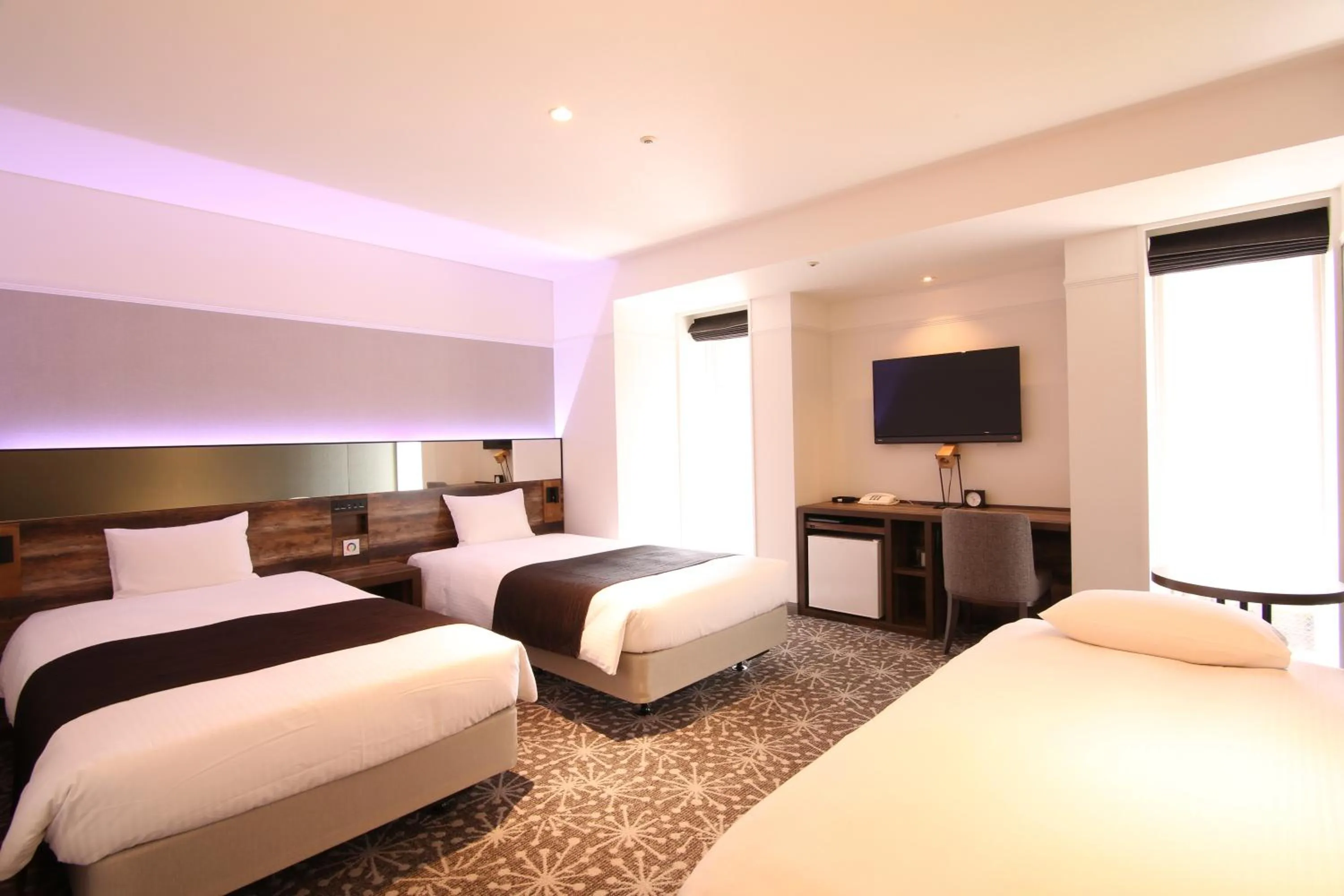 Photo of the whole room, Bed in Quintessa Hotel Sapporo