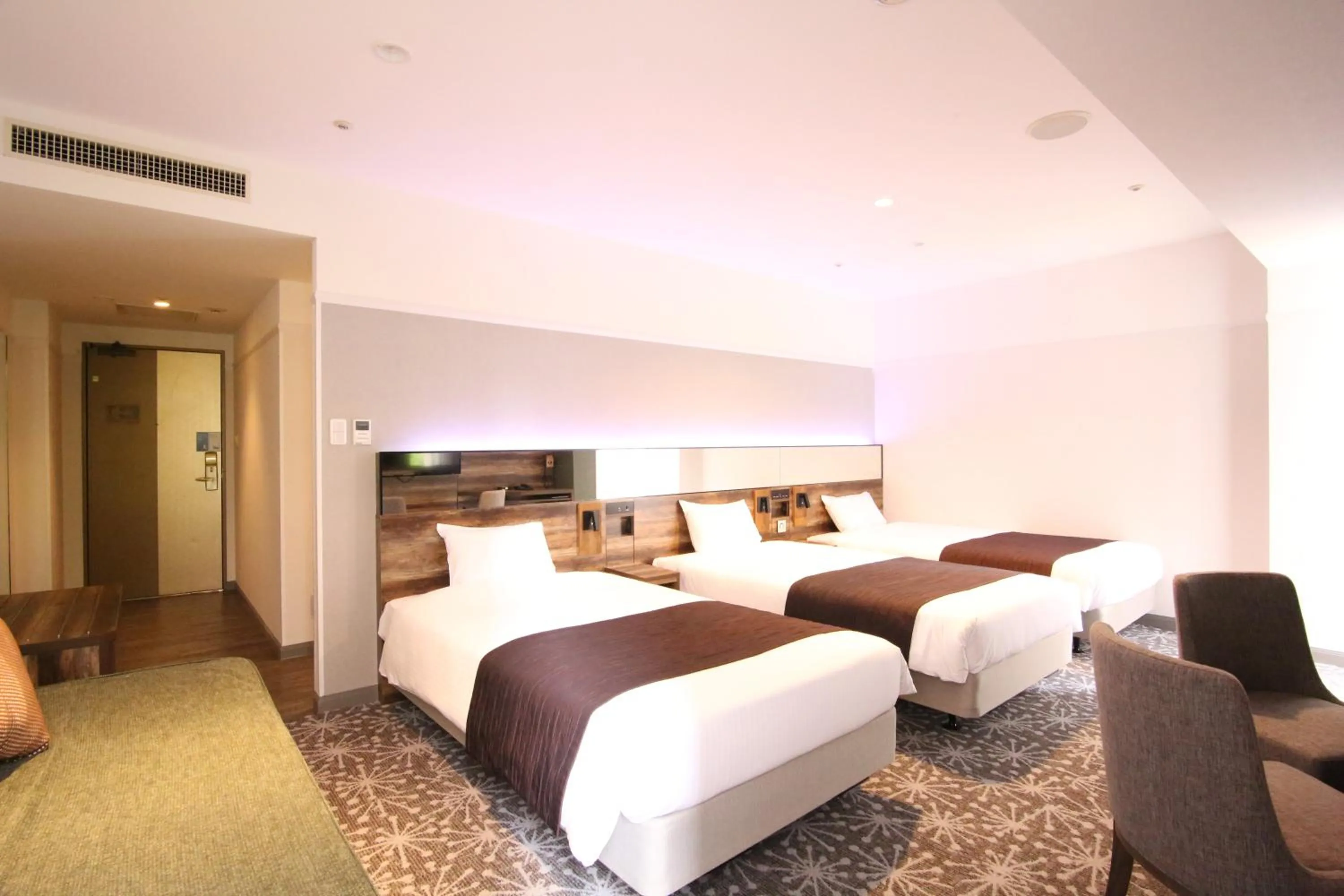 Photo of the whole room, Bed in Quintessa Hotel Sapporo