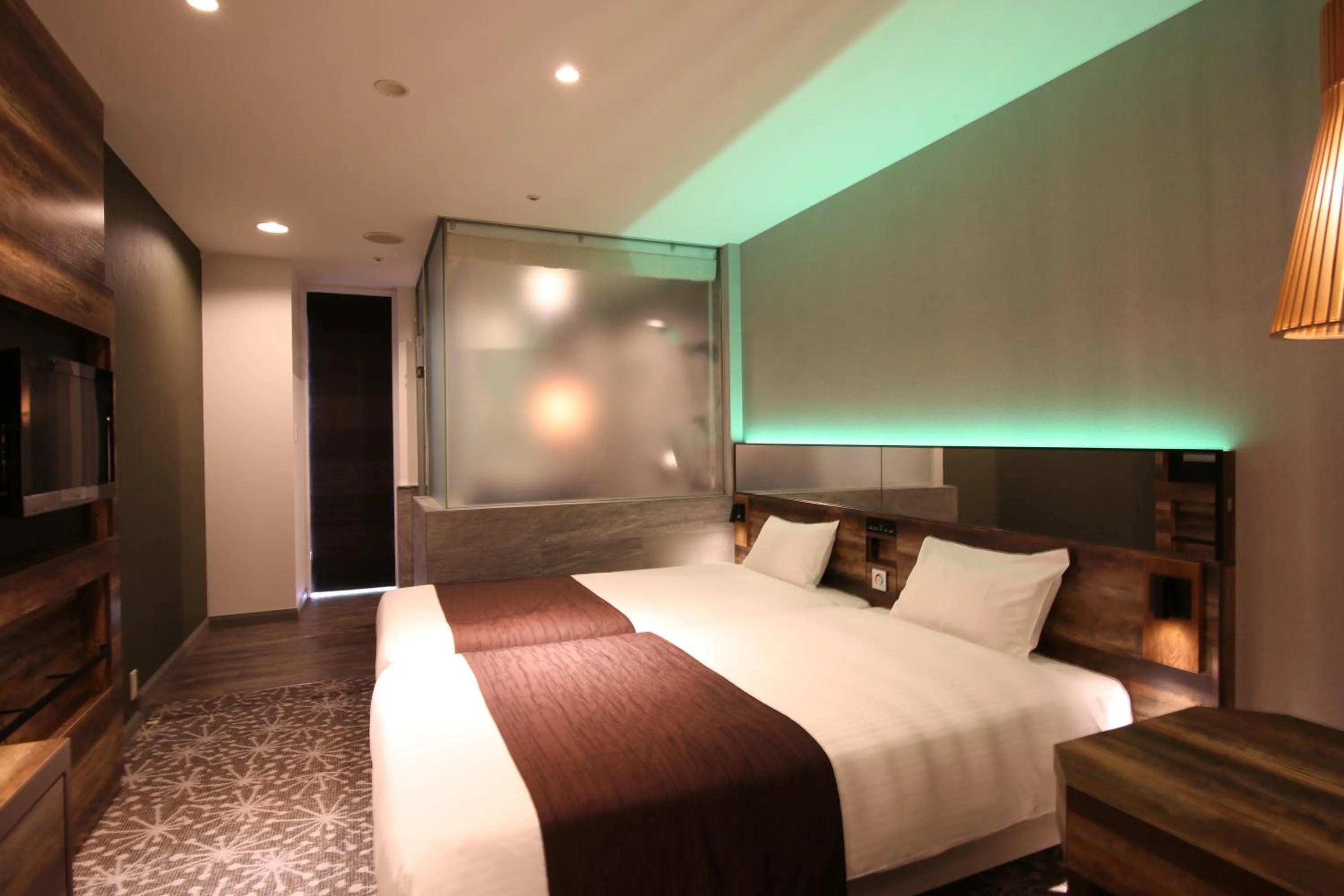 Photo of the whole room, Bed in Quintessa Hotel Sapporo