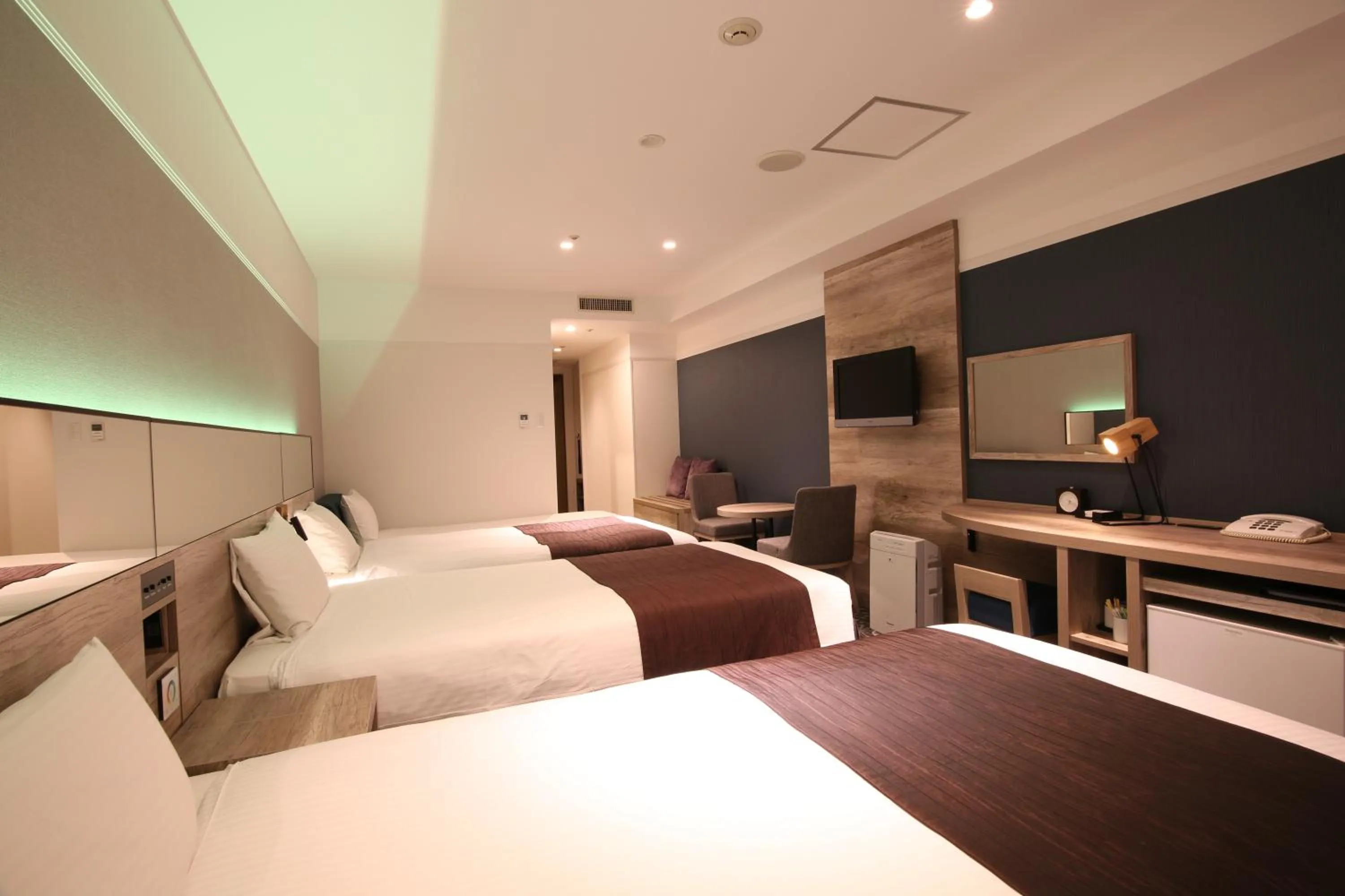 Photo of the whole room, Bed in Quintessa Hotel Sapporo