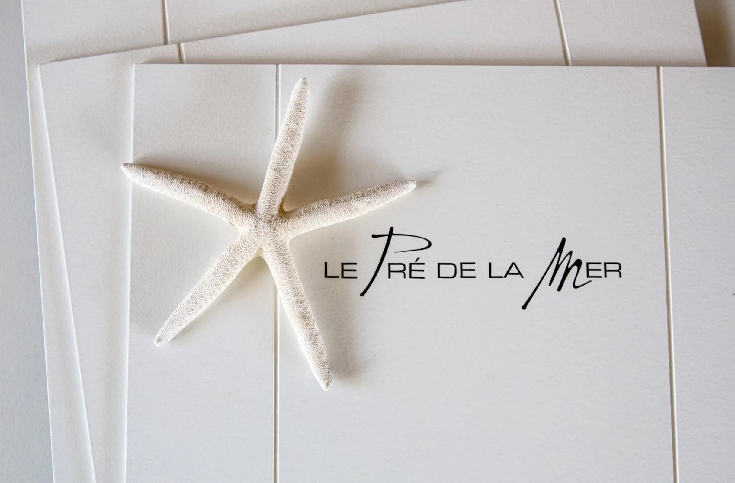 Property logo or sign in Le Pre de la Mer