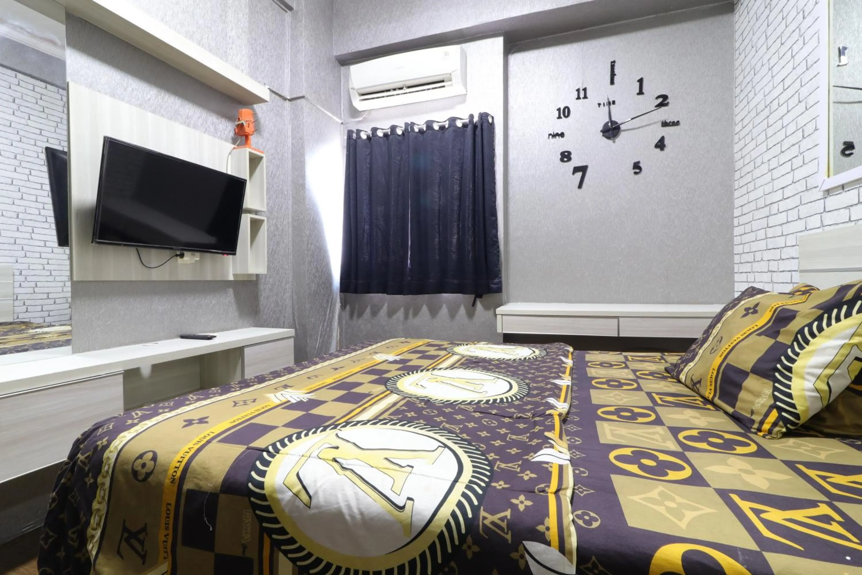 Bedroom, Bed in The Suite Metro Apartment by King Official