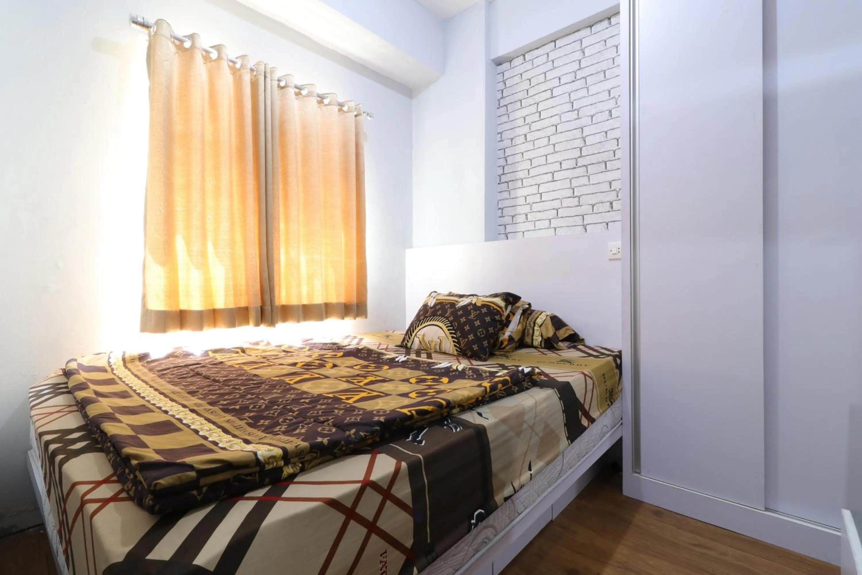 Bedroom, Bed in The Suite Metro Apartment by King Official