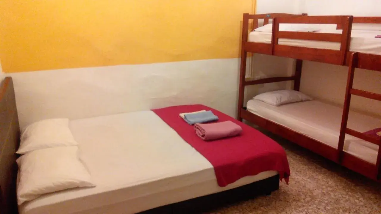 Bed in Cocoa Mews Cafe and Homestay Bed in Cocoa Mews Cafe and Homestay