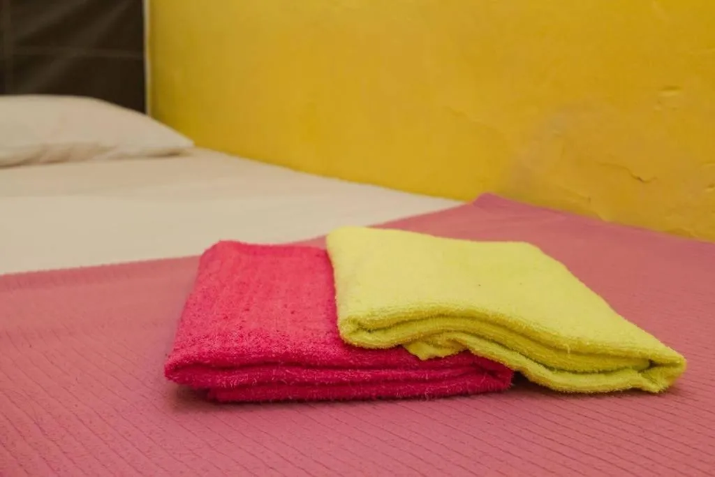 Bed in Cocoa Mews Cafe and Homestay