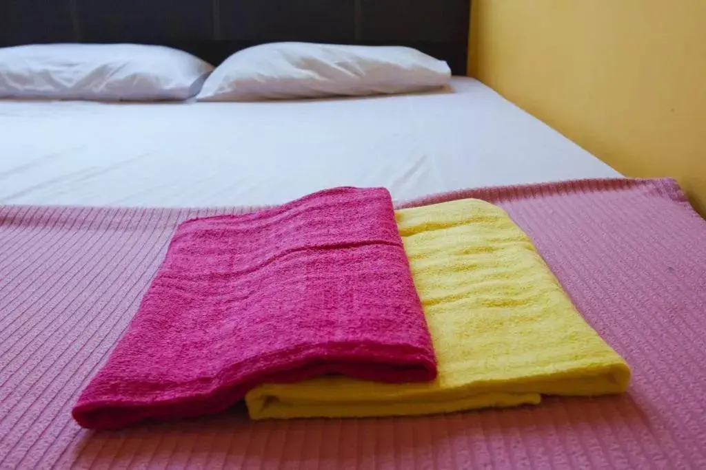 Bed in Cocoa Mews Cafe and Homestay Bed in Cocoa Mews Cafe and Homestay