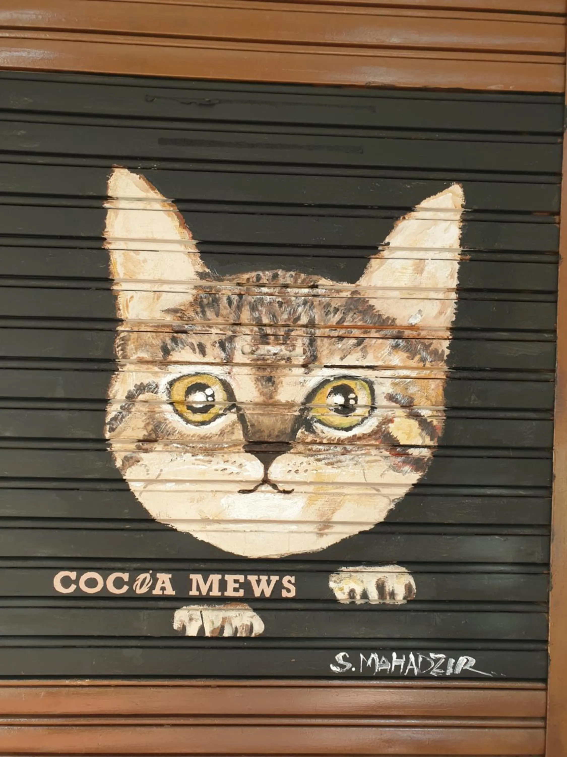 Logo/Certificate/Sign in Cocoa Mews Cafe and Homestay