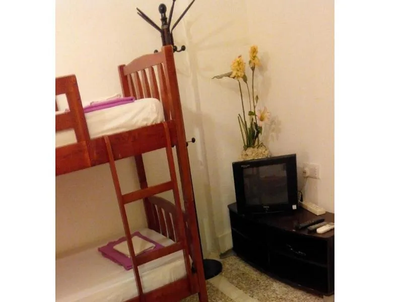 Bed in Cocoa Mews Cafe and Homestay