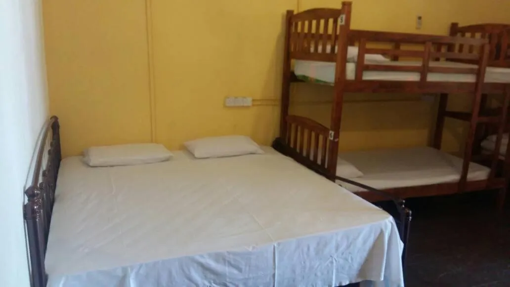Bed in Cocoa Mews Cafe and Homestay